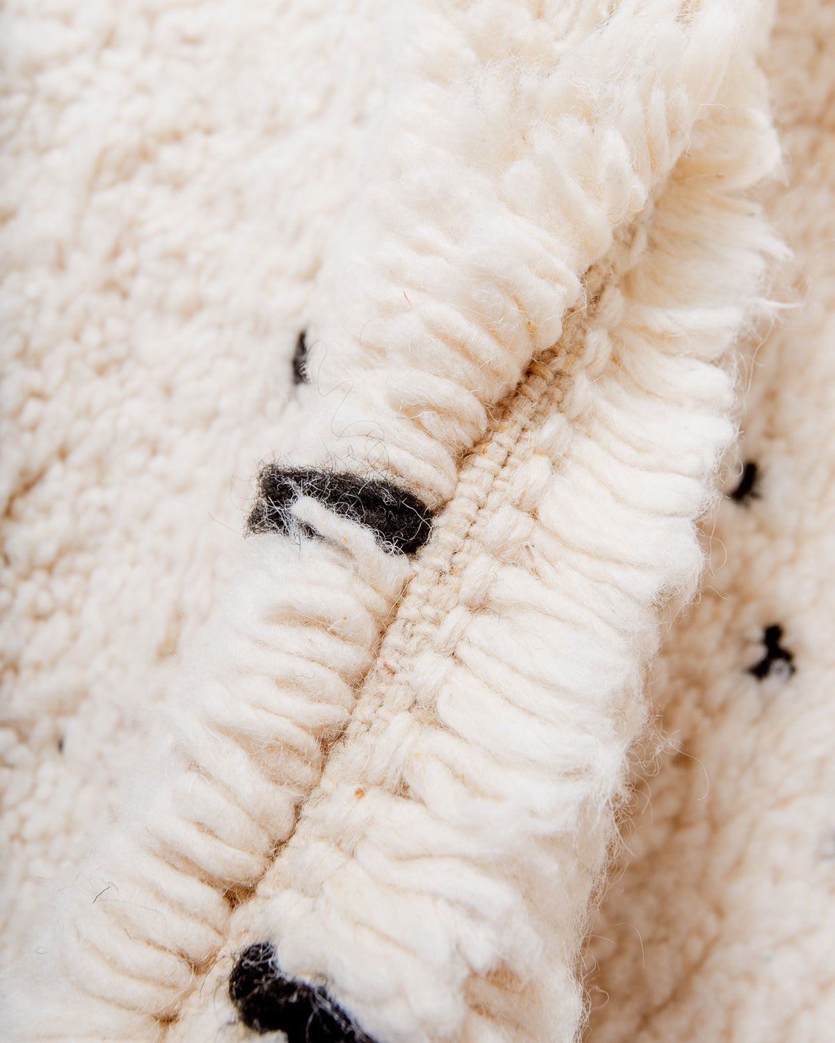 Modern, designer, handcrafted Berber rug from Morocco. Beniourain carpet with beautiful colours and patterns and fluffy wool texture.