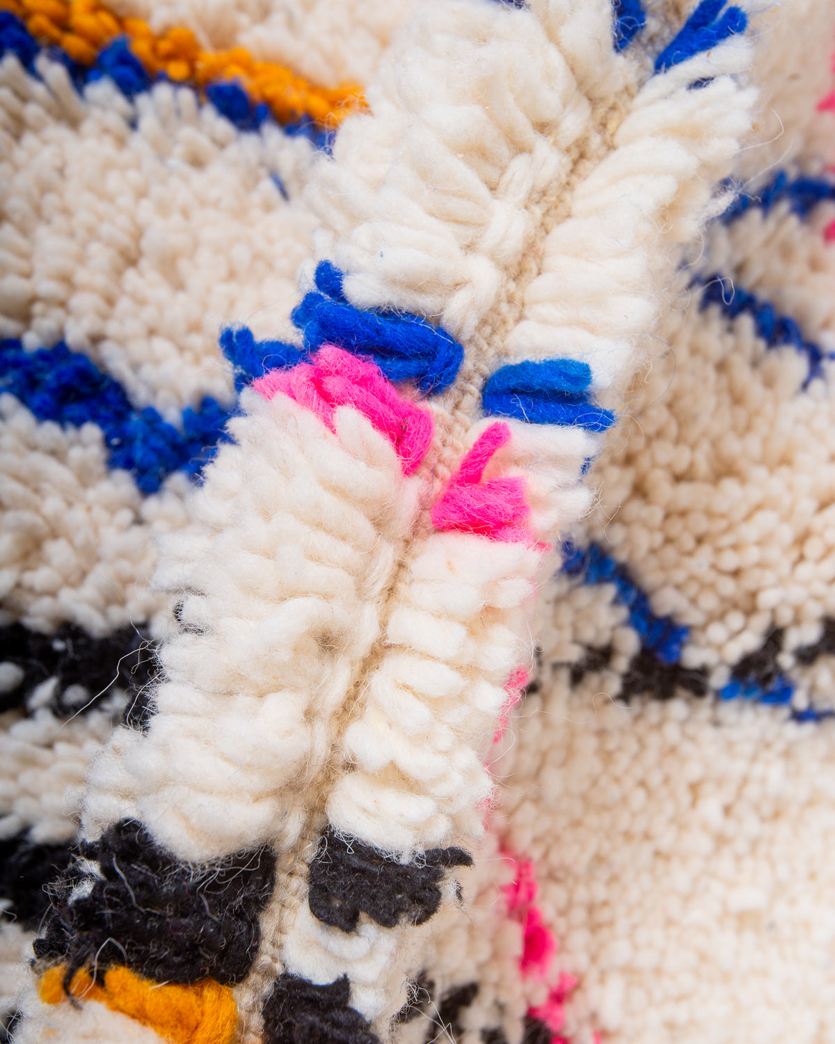 Modern, designer, handcrafted Berber rug from Morocco. Beniourain carpet with beautiful colours and patterns and fluffy wool texture. 