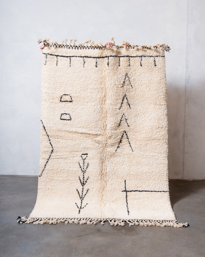 Modern, designer, handcrafted Berber rug from Morocco. Beniourain carpet with minimalist design, natural wool pile and a fluffy texture.