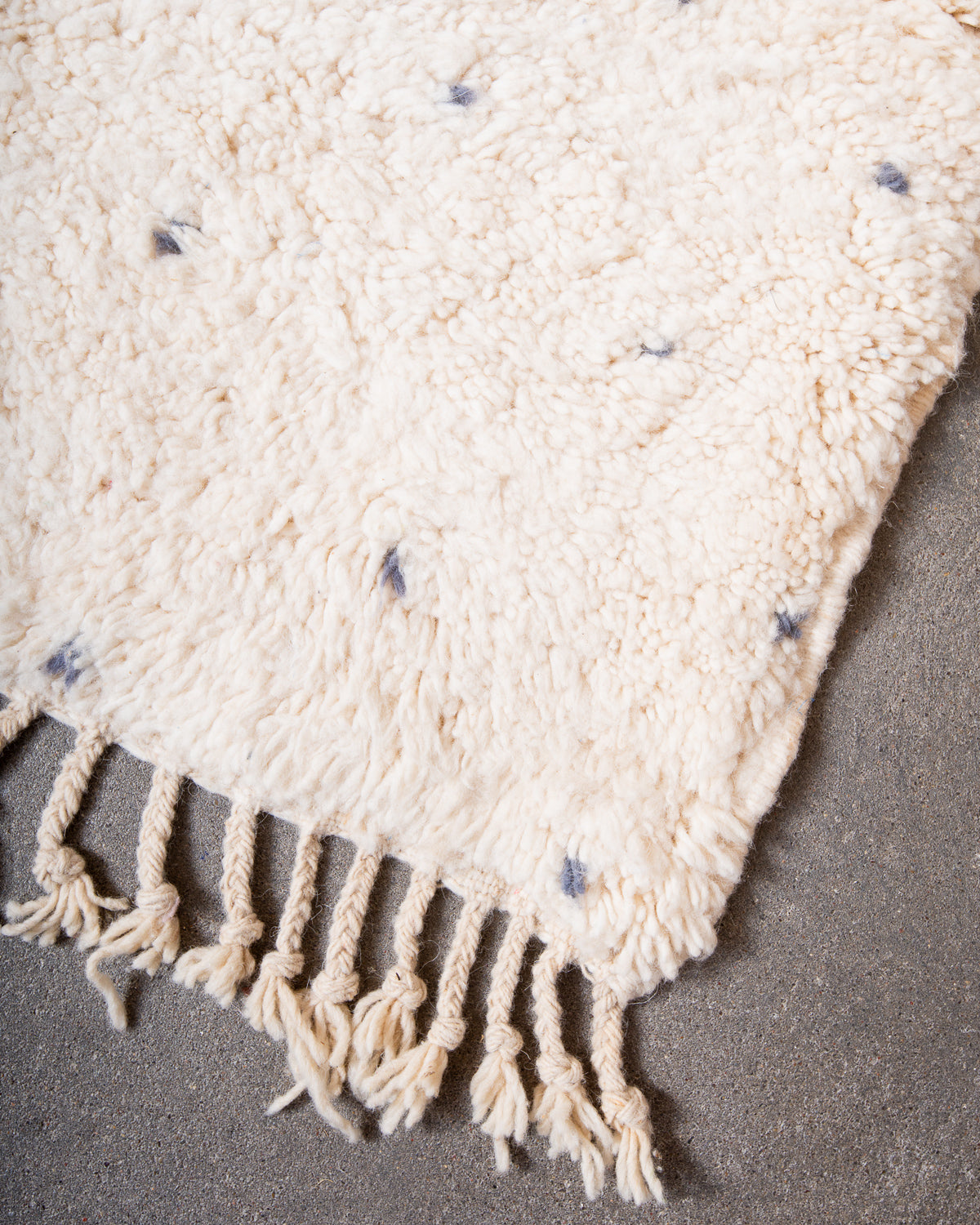 Modern, designer, handcrafted Berber rug from Morocco. Beniourain carpet with minimalist design, natural wool pile and a fluffy texture.