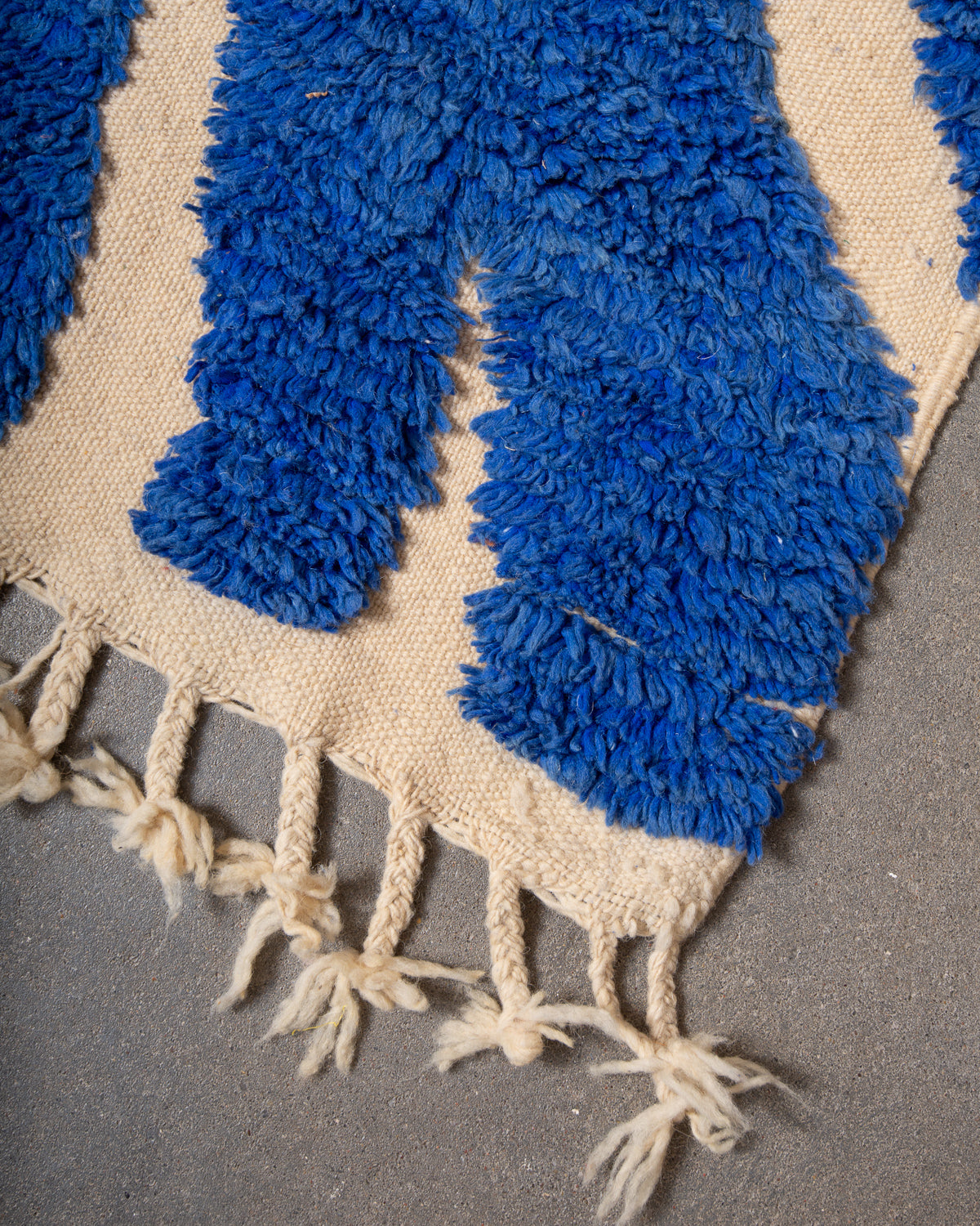 Modern, designer, handcrafted Berber rug from Morocco. Beniourain carpet with beautiful colours and patterns and fluffy wool texture.
