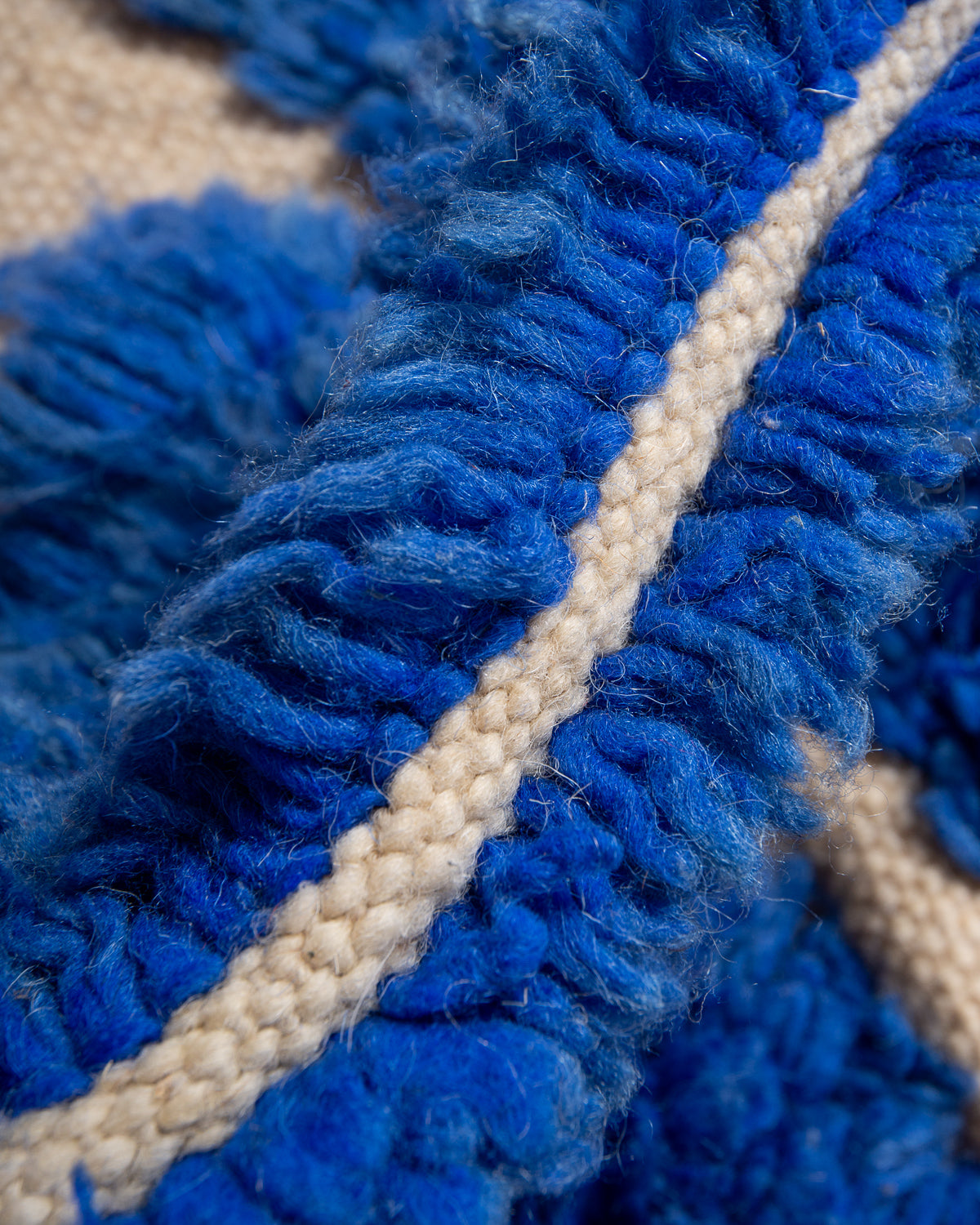 Modern, designer, handcrafted Berber rug from Morocco. Beniourain carpet with beautiful colours and patterns and fluffy wool texture.