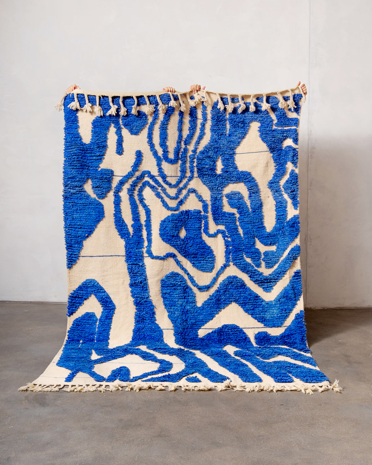 Modern, designer, handcrafted Berber rug from Morocco. Beniourain carpet with beautiful colours and patterns and fluffy wool texture.