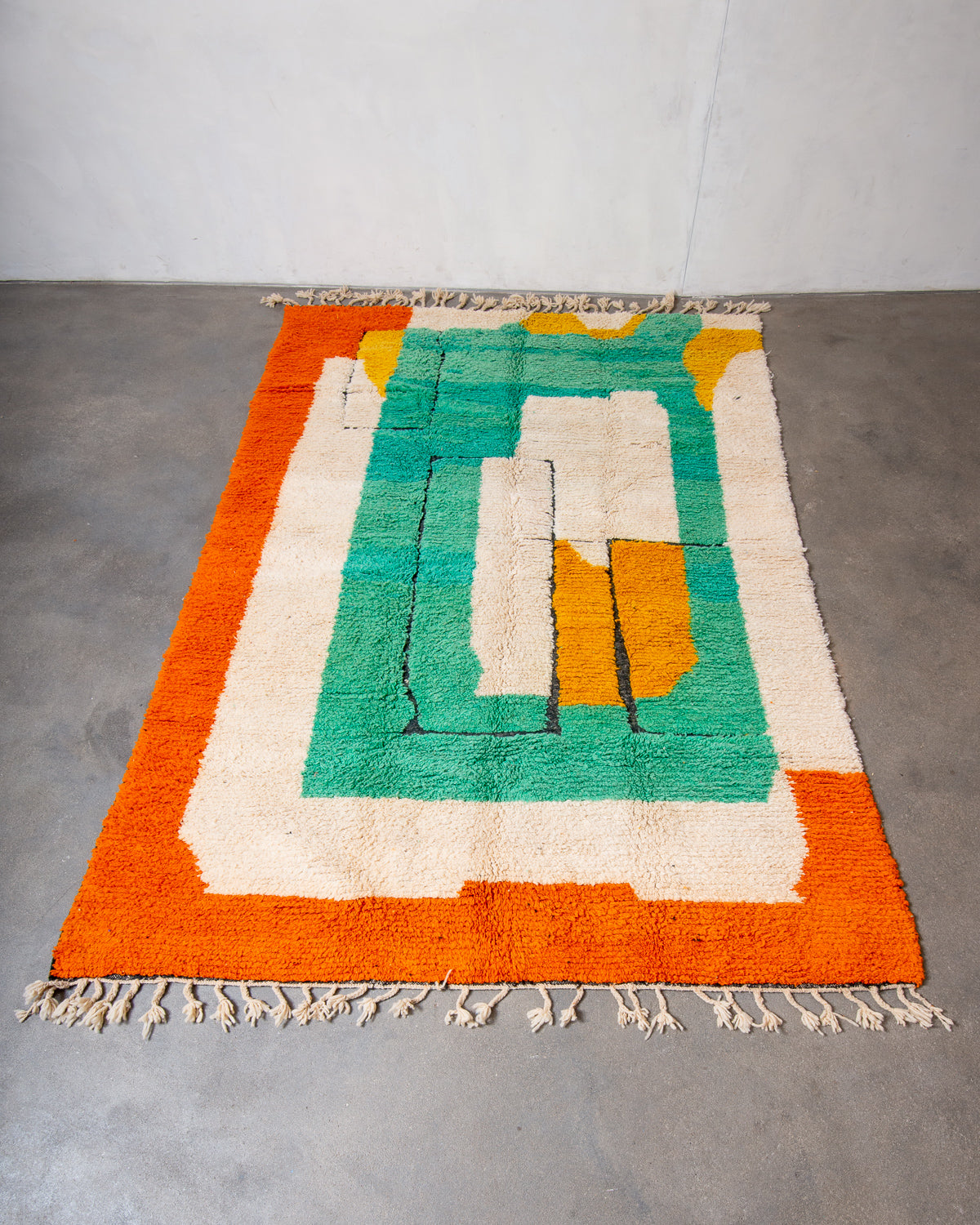 Modern, designer, handcrafted Berber rug from Morocco. Beniourain carpet with beautiful colours and patterns and fluffy wool texture.