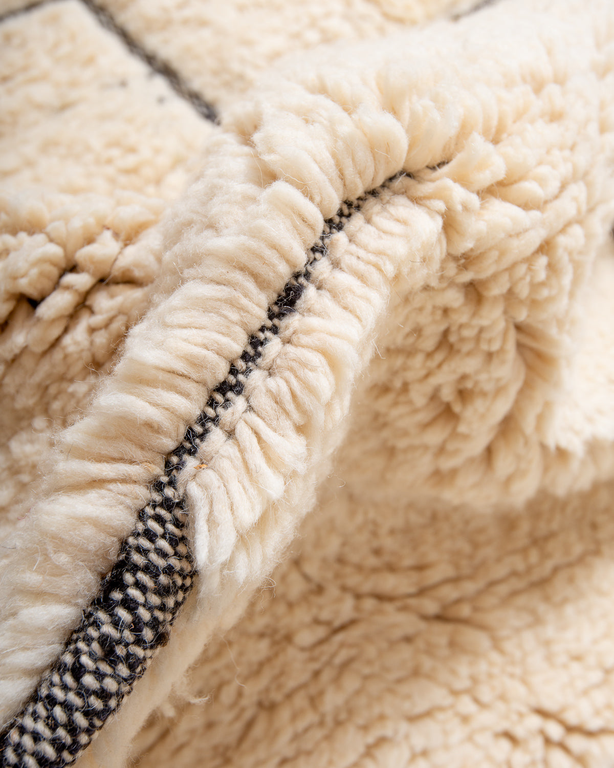 Modern, designer, handcrafted Berber rug from Morocco. Beniourain carpet with beautiful colours and patterns and fluffy wool texture.