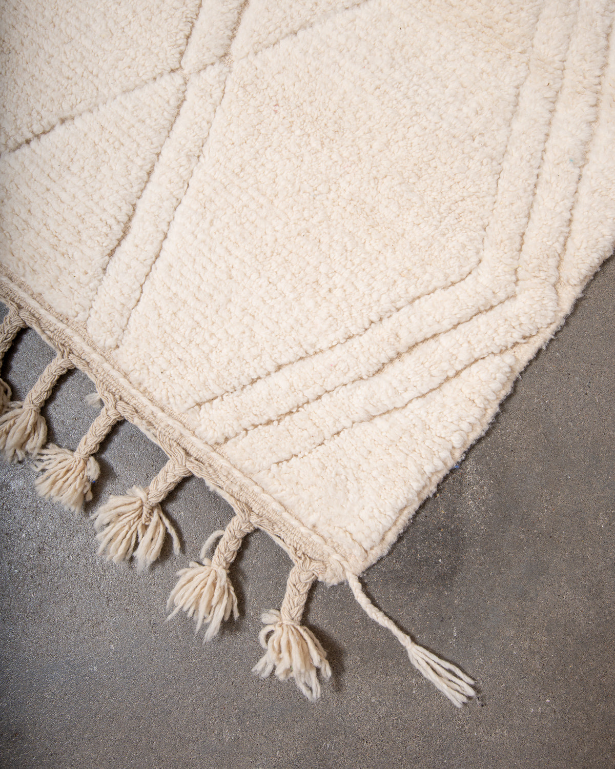 Modern, designer, handcrafted Berber rug from Morocco. Beniourain carpet with minimalist design, natural wool pile and a fluffy texture.