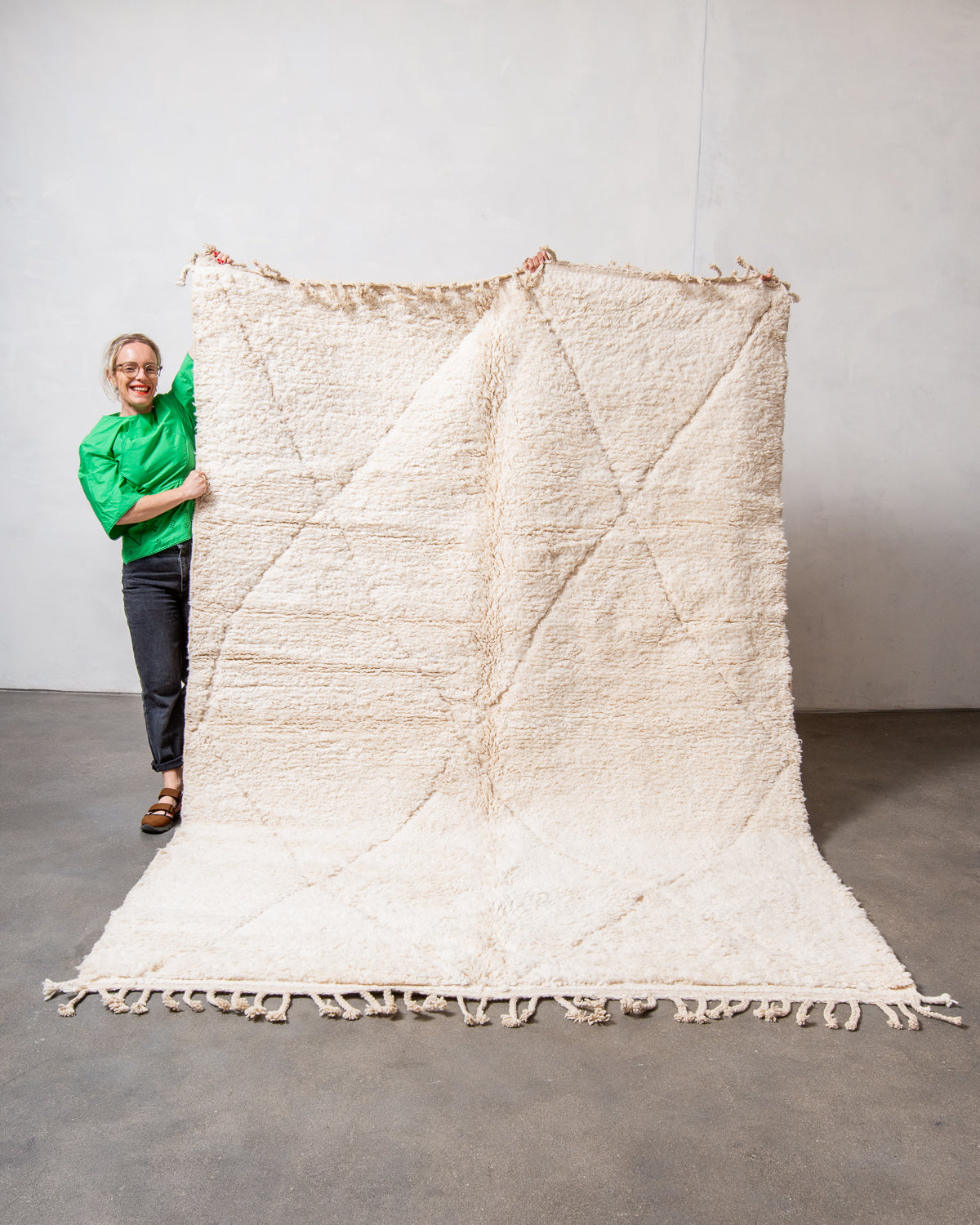 Modern, designer, handcrafted Berber rug from Morocco. Beniourain carpet with minimalist design, natural wool pile and a fluffy texture.