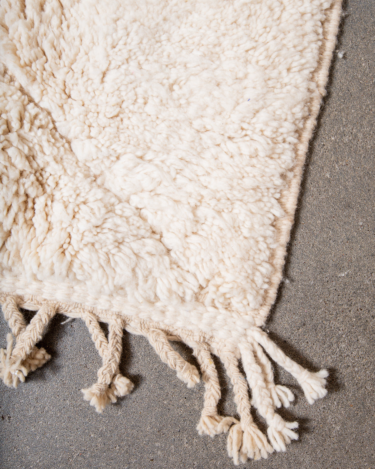 Modern, designer, handcrafted Berber rug from Morocco. Beniourain carpet with minimalist design, natural wool pile and a fluffy texture.