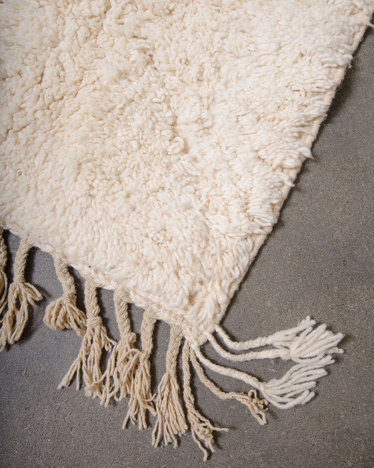 Modern, designer, handcrafted Berber rug from Morocco. Beniourain carpet with minimalist design, natural wool pile and a fluffy texture.