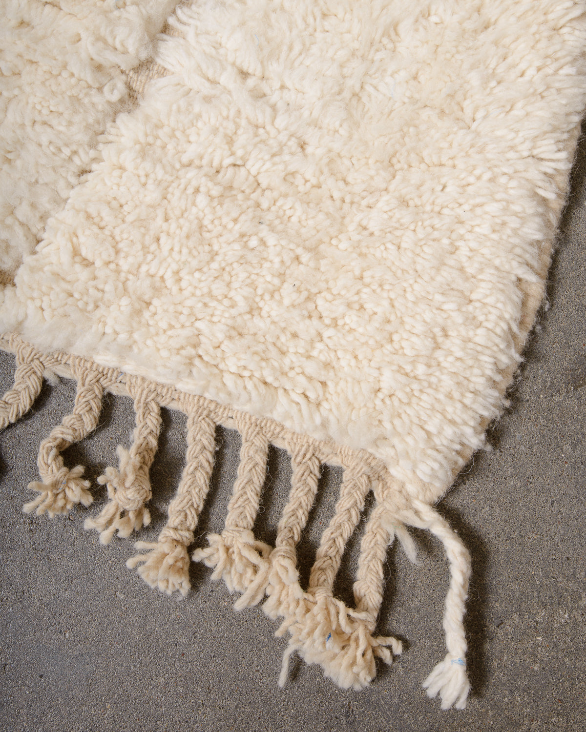 Modern, designer, handcrafted Berber rug from Morocco. Beniourain carpet with minimalist design, natural wool pile and a fluffy texture.