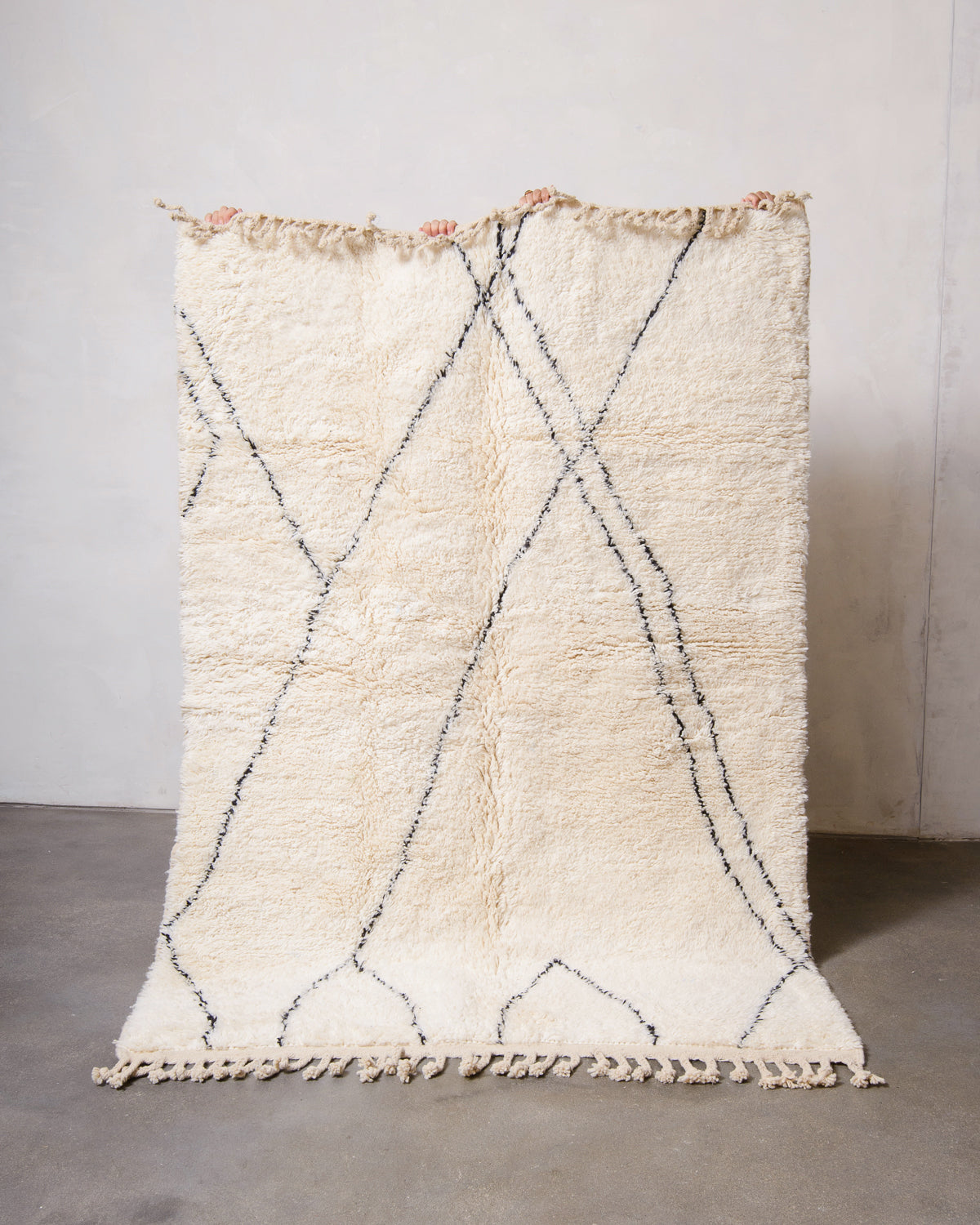 Modern, designer, handcrafted Berber rug from Morocco. Beniourain carpet with minimalist design, natural wool pile and a fluffy texture.