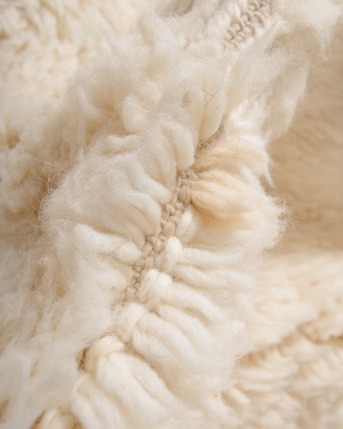 Modern, designer, handcrafted Berber rug from Morocco. Beniourain carpet with minimalist design, natural wool pile and a fluffy texture.