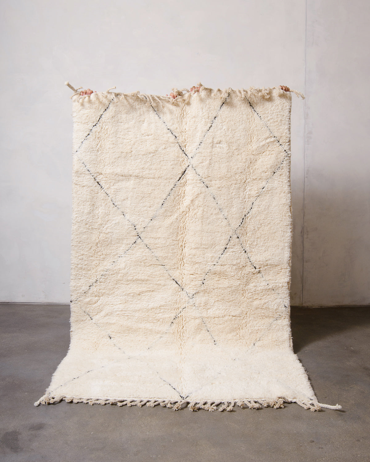 Modern, designer, handcrafted Berber rug from Morocco. Beniourain carpet with minimalist design, natural wool pile and a fluffy texture.