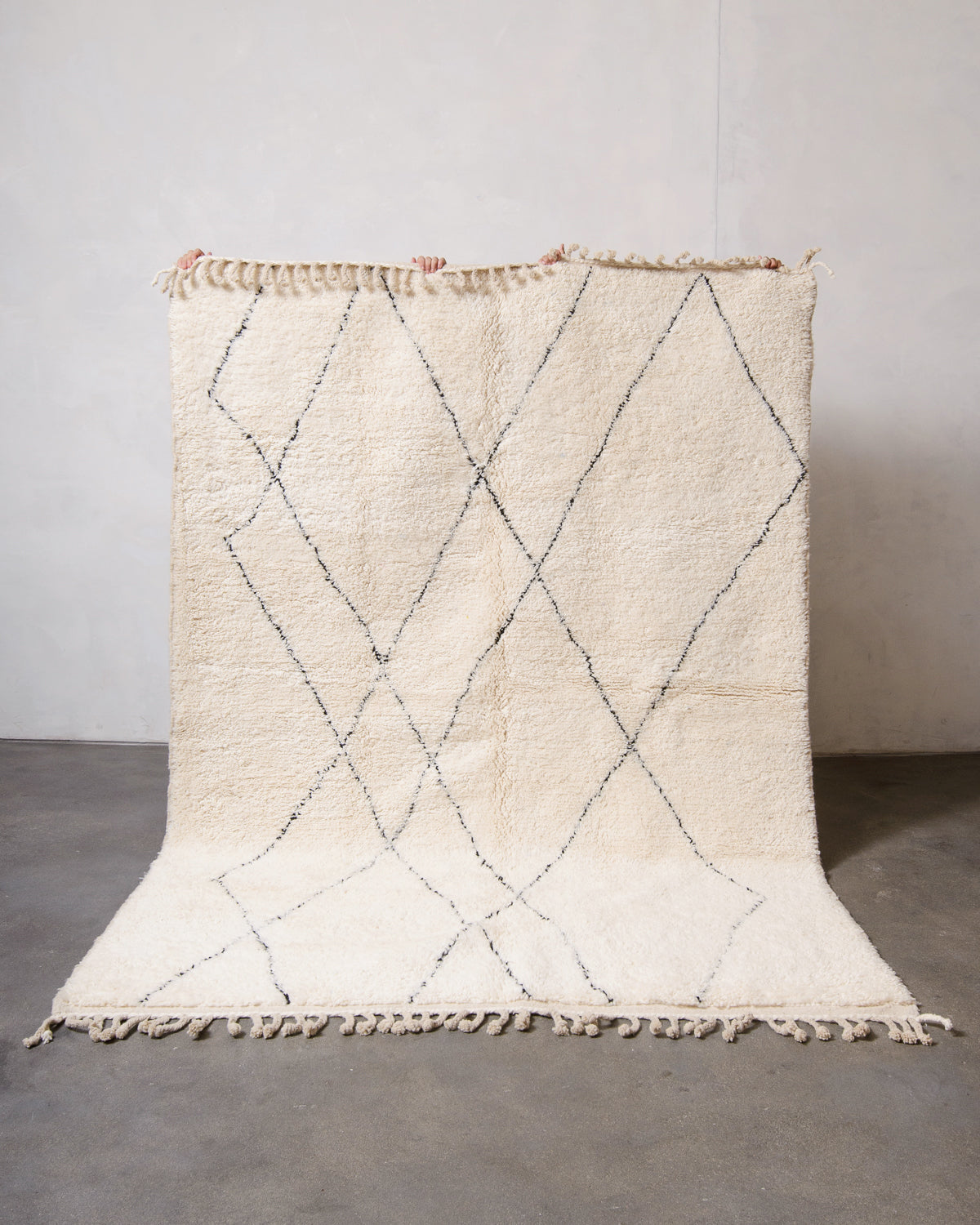 Modern, designer, handcrafted Berber rug from Morocco. Beniourain carpet with minimalist design, natural wool pile and a fluffy texture.