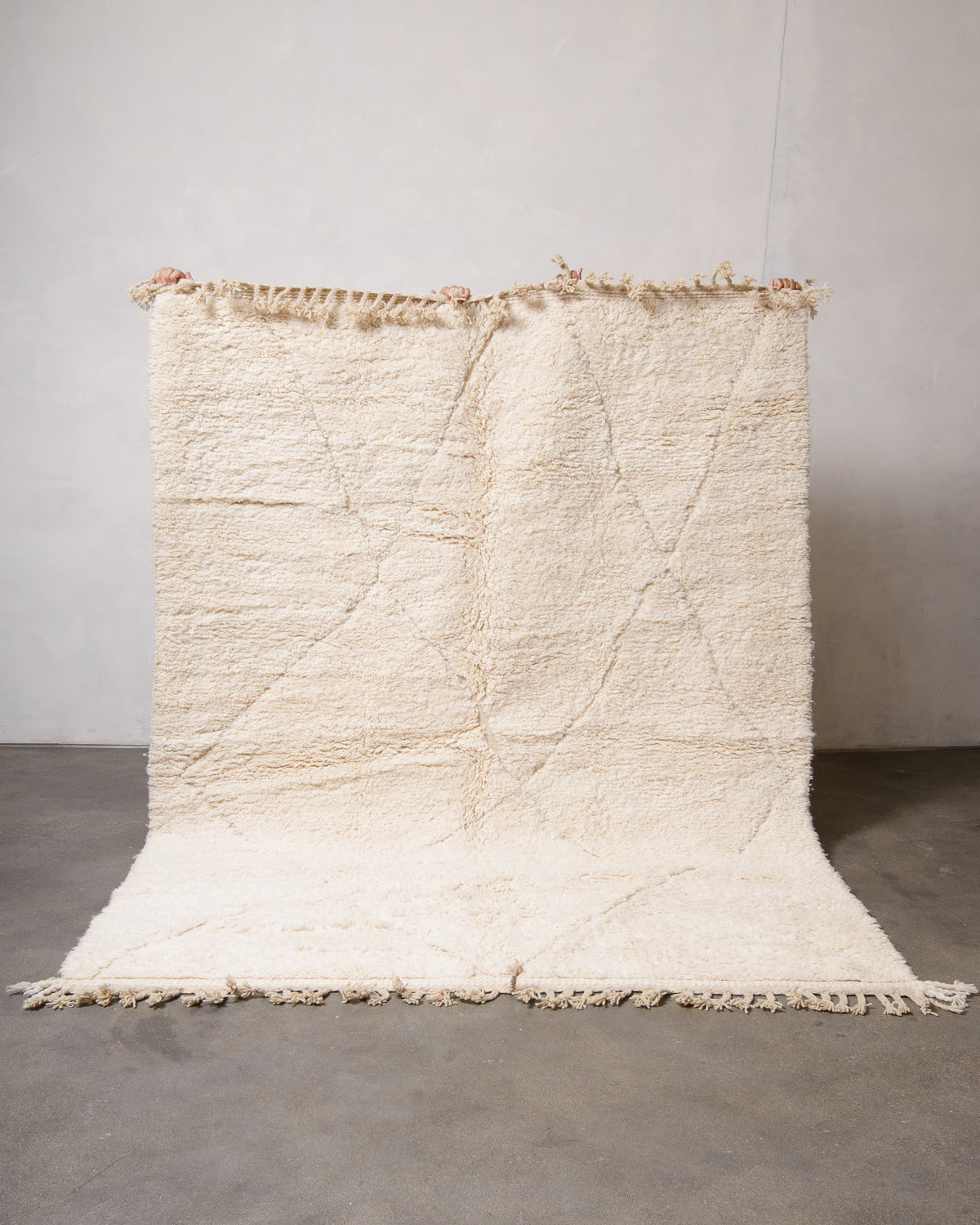 Modern, designer, handcrafted Berber rug from Morocco. Beniourain carpet with minimalist design, natural wool pile and a fluffy texture.