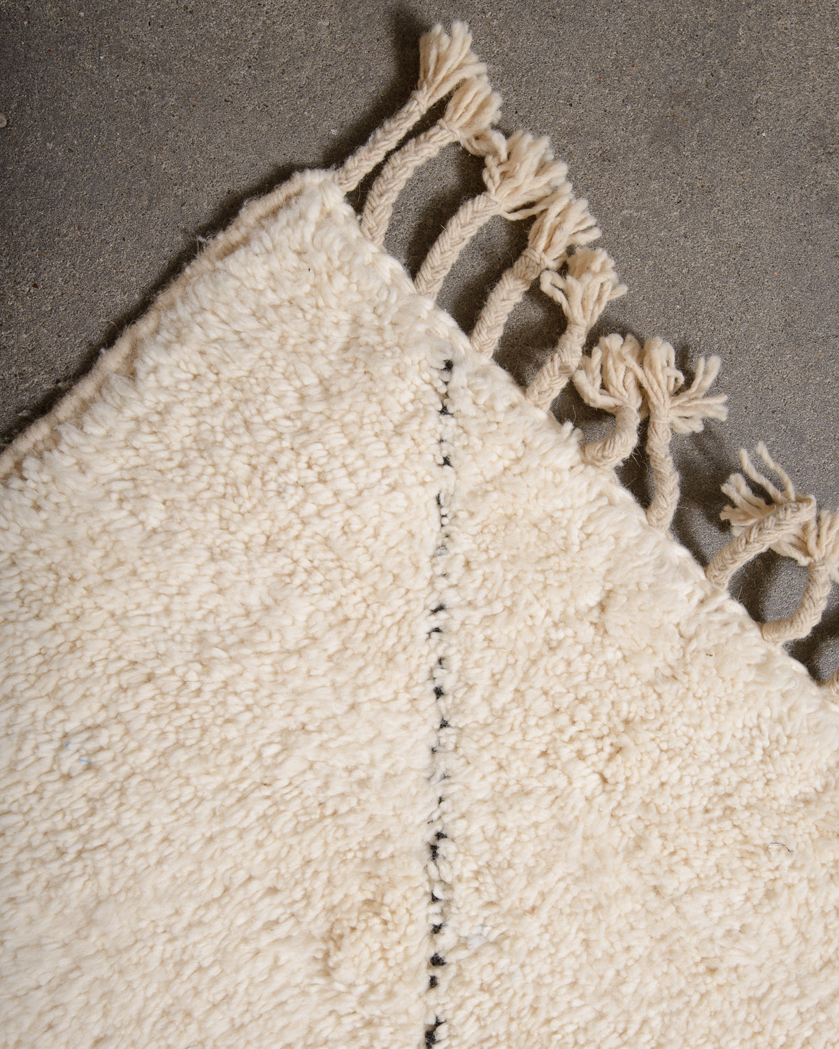 Modern, designer, handcrafted Berber rug from Morocco. Beniourain carpet with minimalist design, natural wool pile and a fluffy texture.