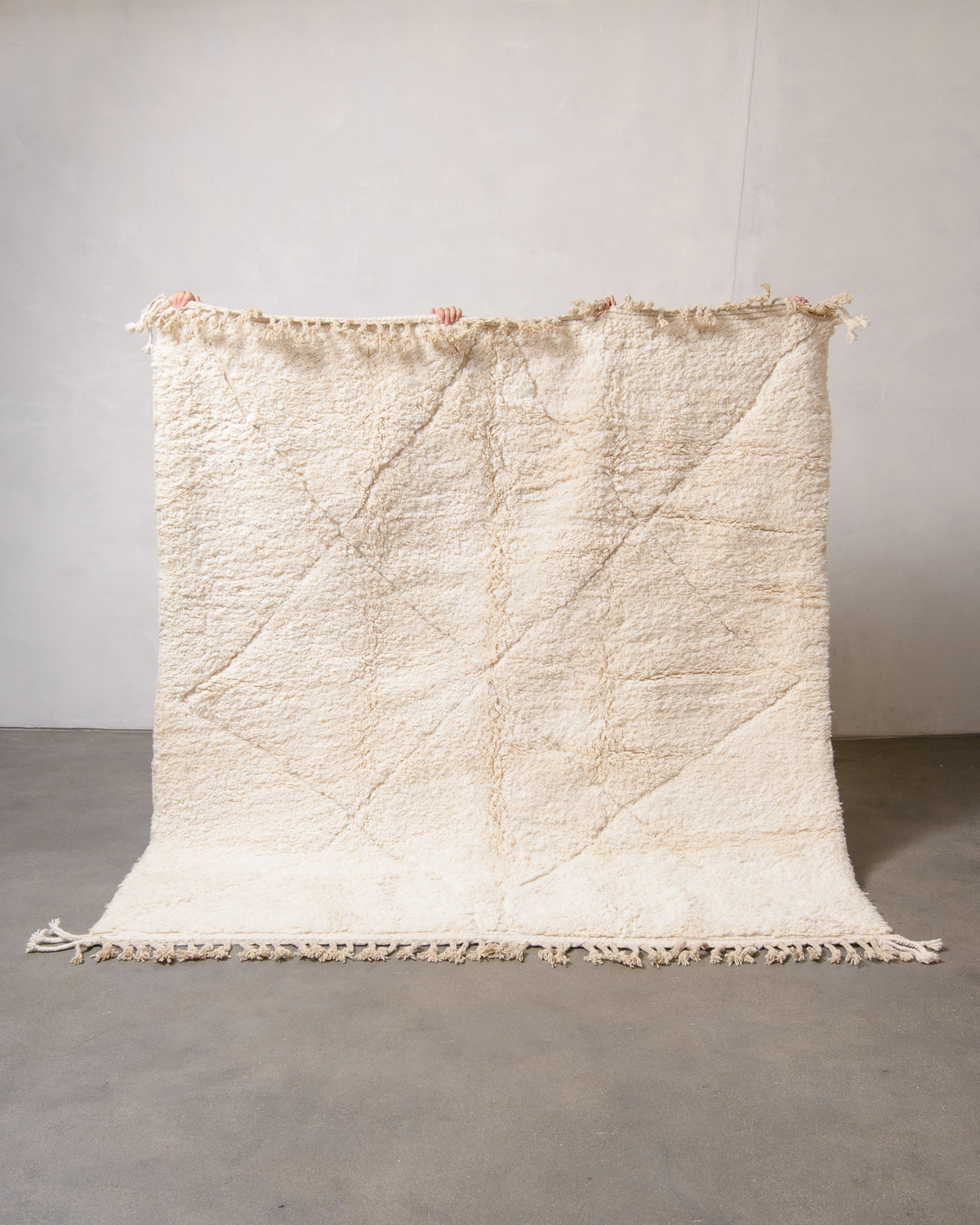 Modern, designer, handcrafted Berber rug from Morocco. Beniourain carpet with minimalist design, natural wool pile and a fluffy texture.