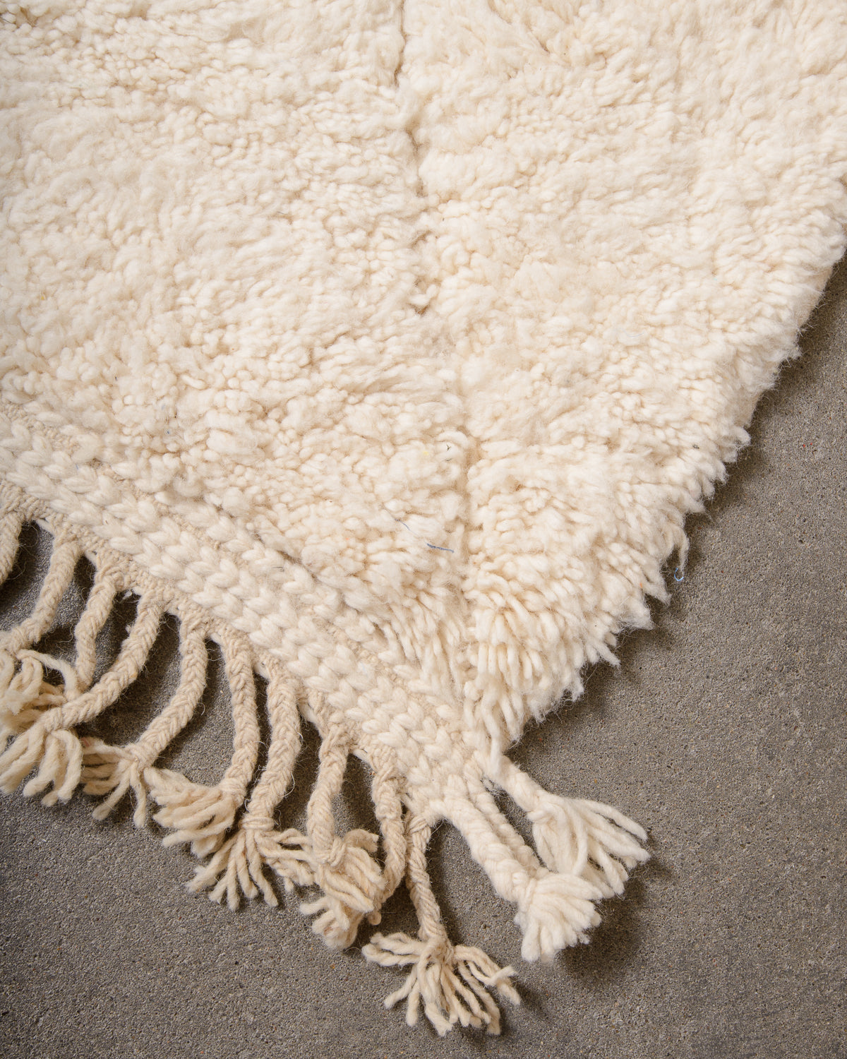 Modern, designer, handcrafted Berber rug from Morocco. Beniourain carpet with minimalist design, natural wool pile and a fluffy texture.