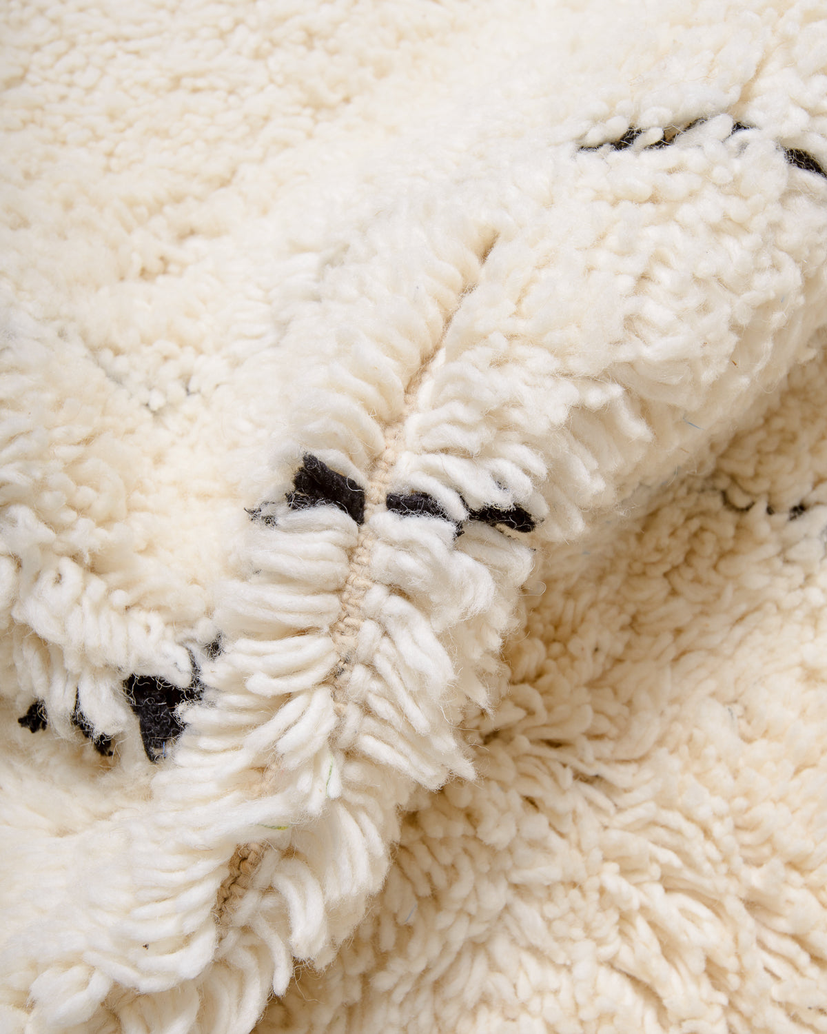 Modern, designer, handcrafted Berber rug from Morocco. Beniourain carpet with minimalist design, natural wool pile and a fluffy texture.