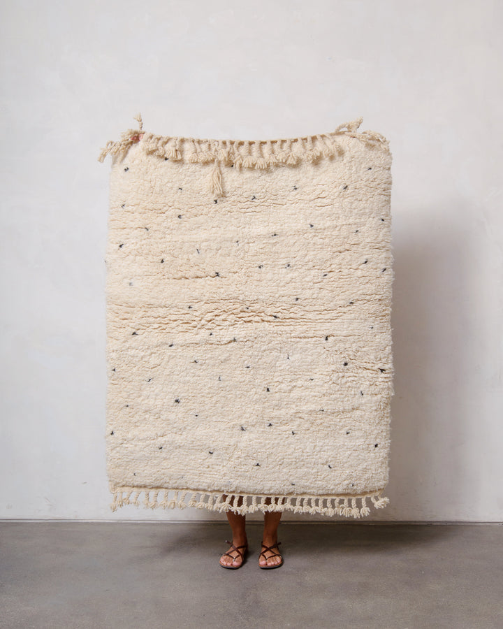 Modern, designer, handcrafted Berber rug from Morocco. Beniourain carpet with minimalist design, natural wool pile and a fluffy texture.