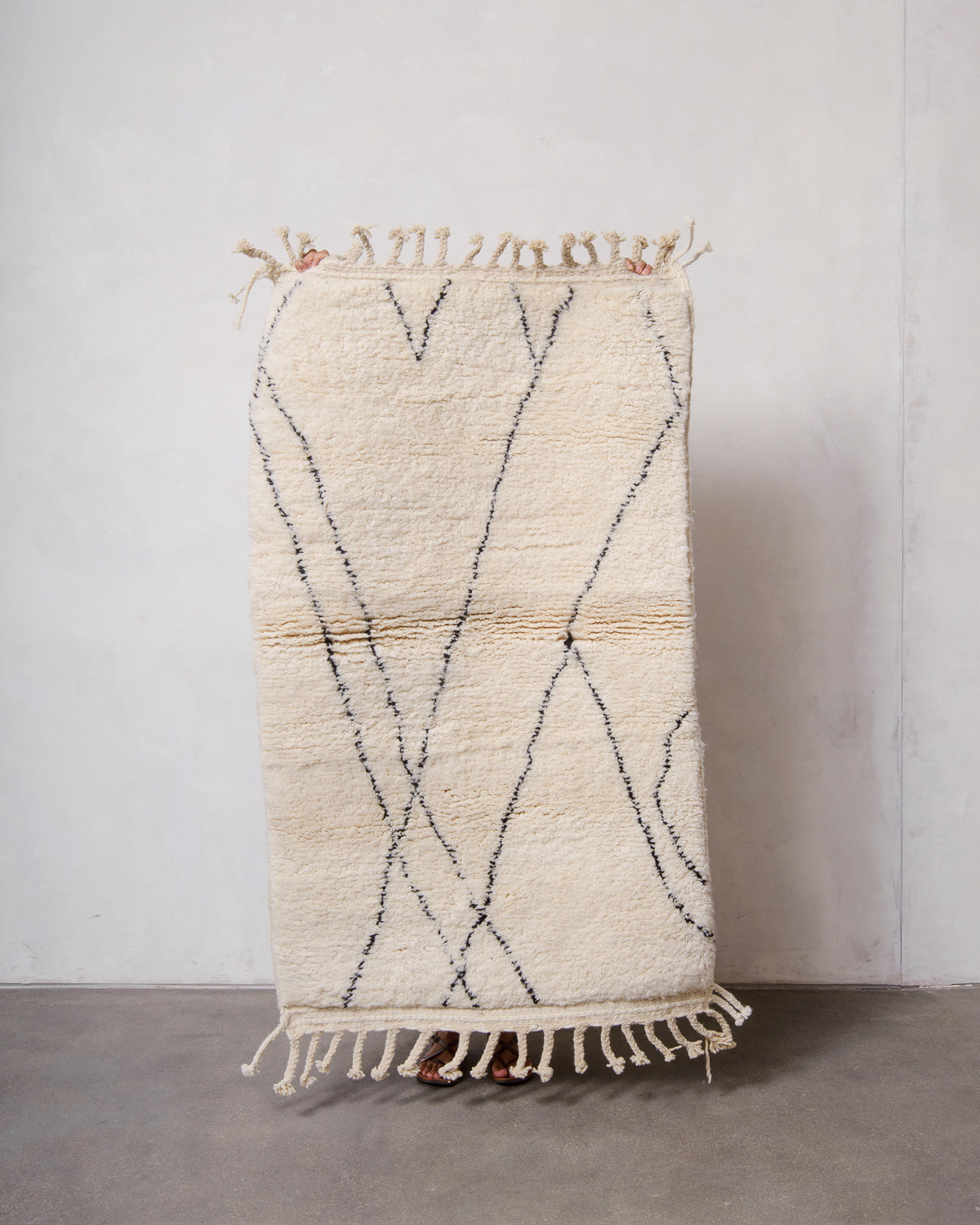 Modern, designer, handcrafted Berber rug from Morocco. Beniourain carpet with minimalist design, natural wool pile and a fluffy texture.