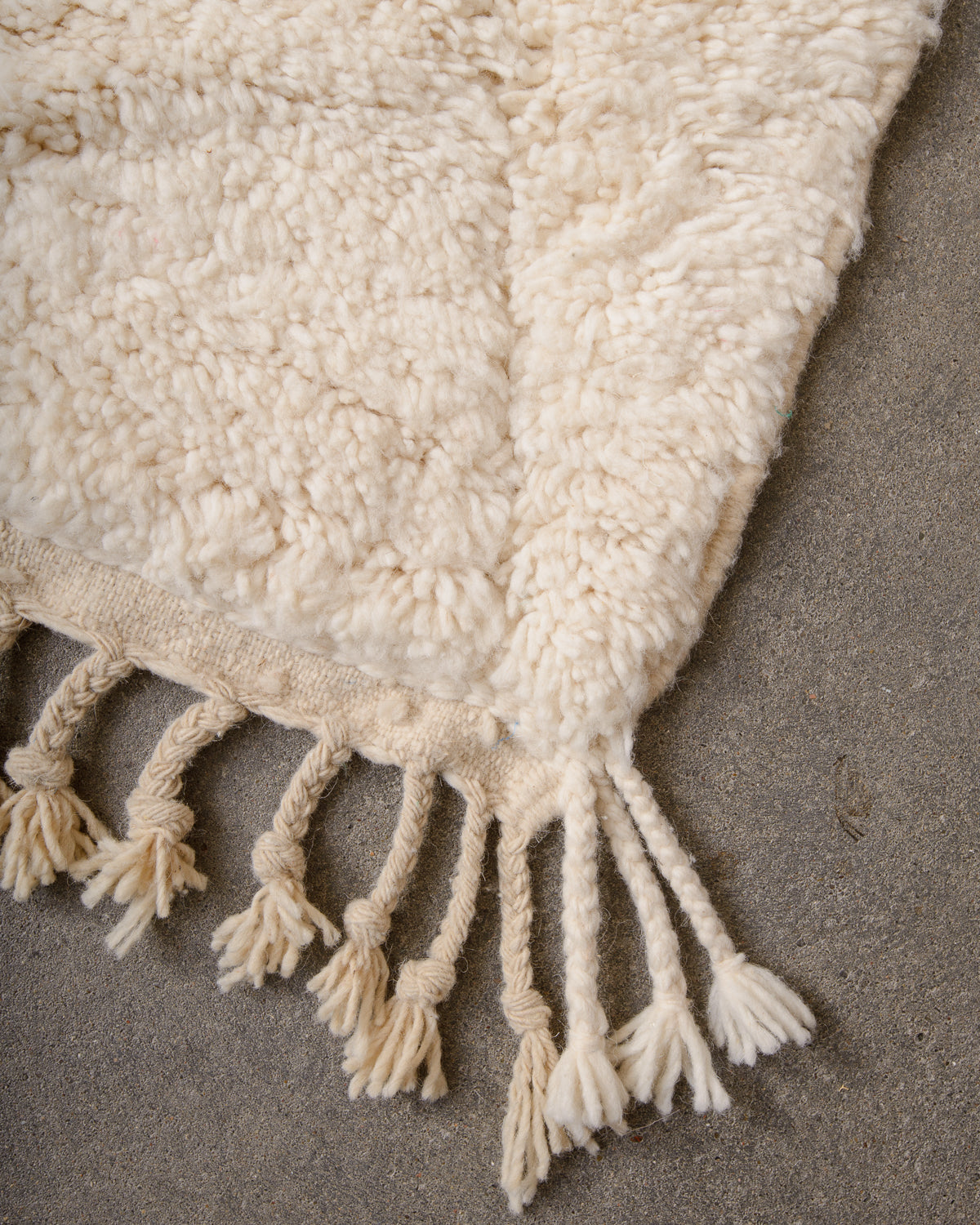 Modern, designer, handcrafted Berber rug from Morocco. Beniourain carpet with minimalist design, natural wool pile and a fluffy texture.