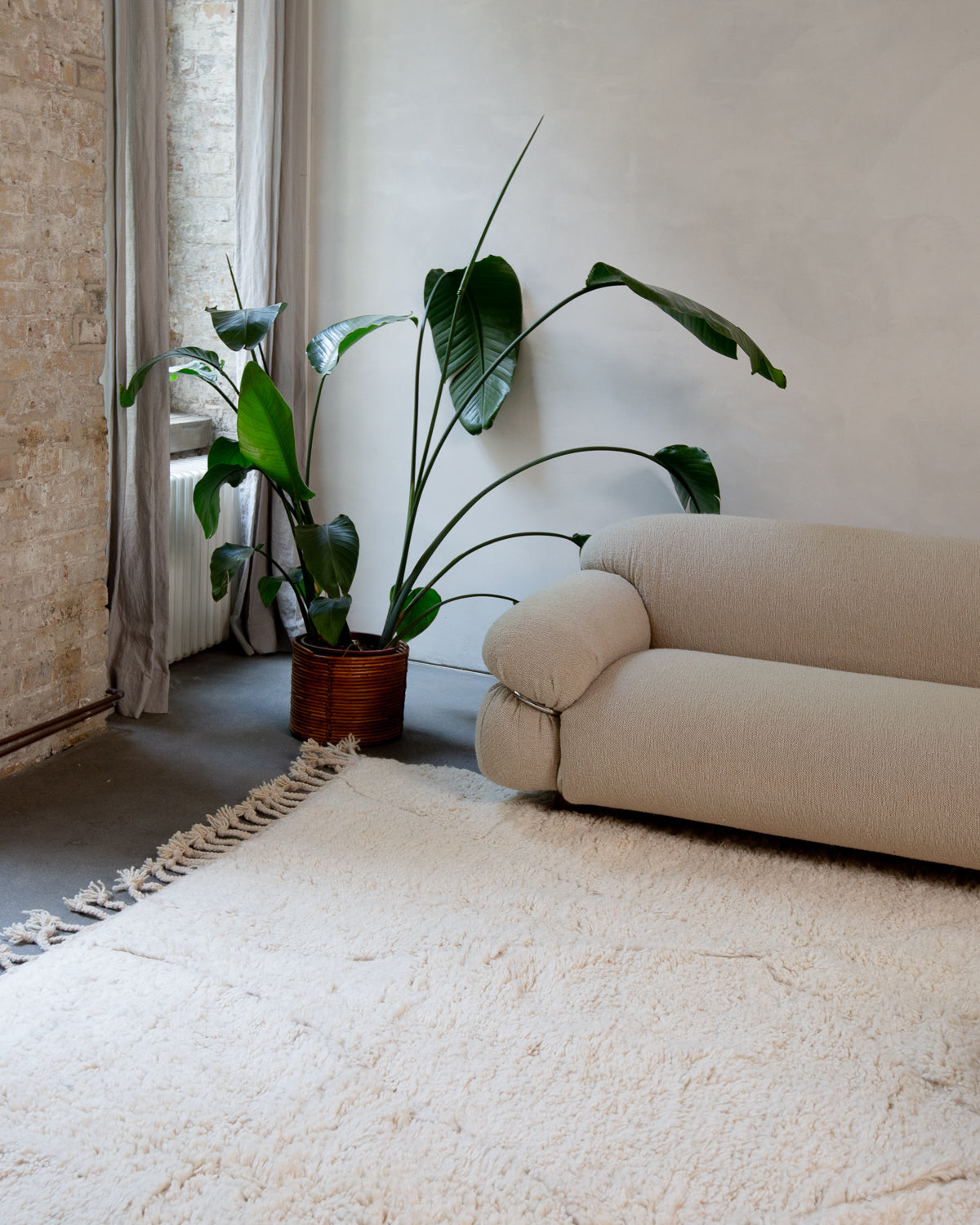 Modern, designer, handcrafted Berber rug from Morocco. Beniourain carpet with minimalist design, natural wool pile and a fluffy texture.