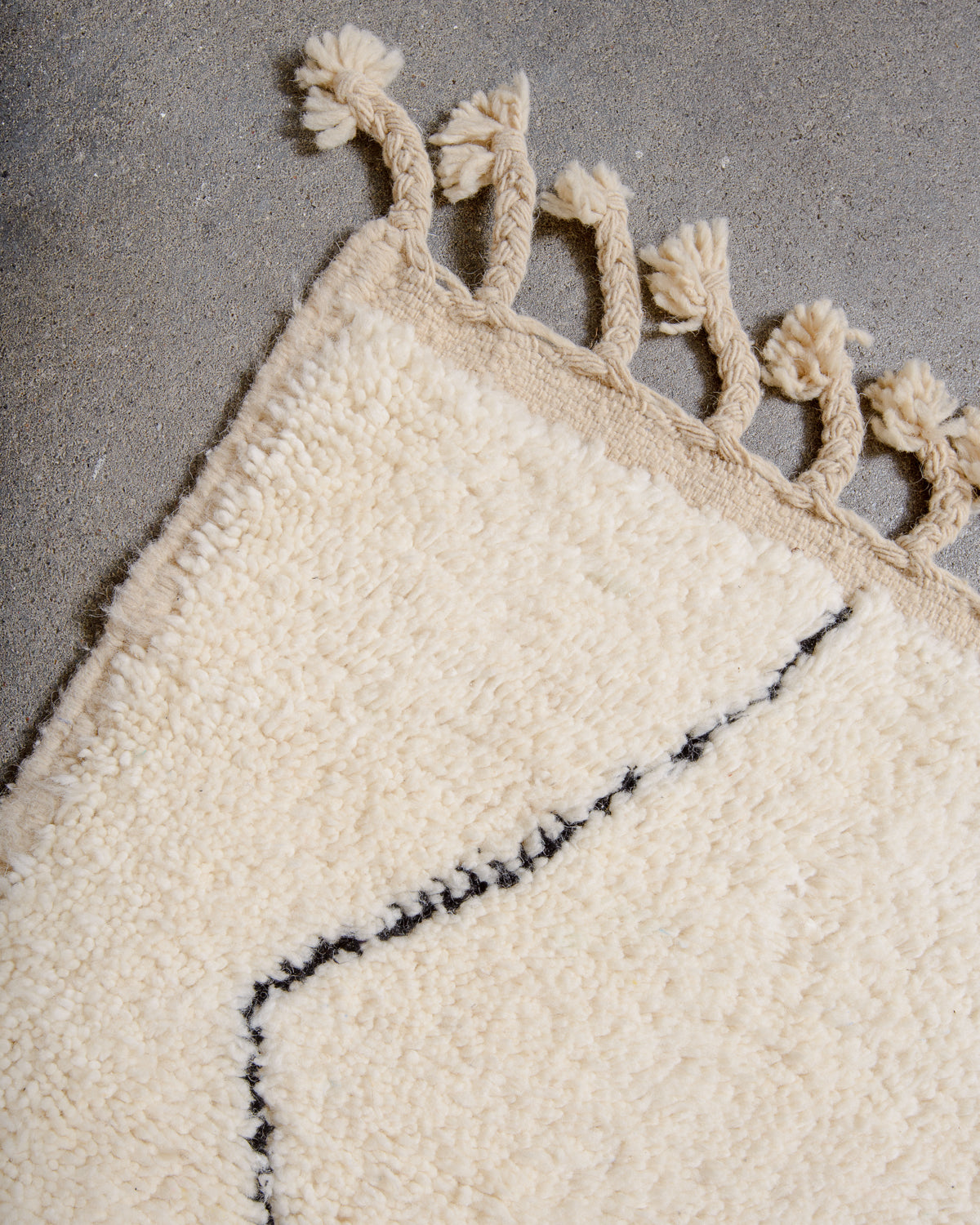 Modern, designer, handcrafted Berber rug from Morocco. Beniourain carpet with minimalist design, natural wool pile and a fluffy texture.