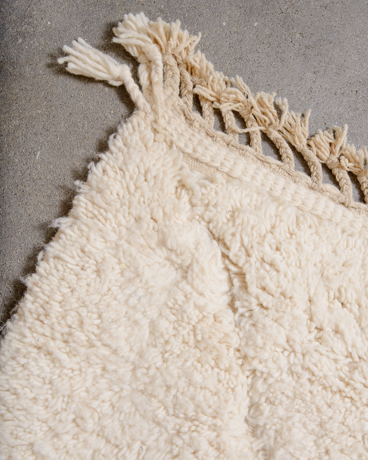 Modern, designer, handcrafted Berber rug from Morocco. Beniourain carpet with minimalist design, natural wool pile and a fluffy texture.