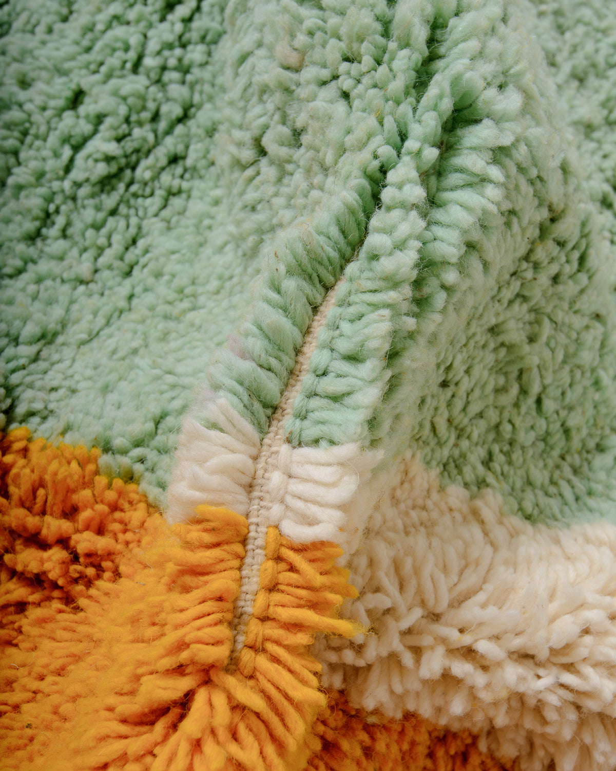 Modern, designer, handcrafted Berber rug from Morocco. Beniourain carpet with beautiful colours and patterns and fluffy wool texture. 