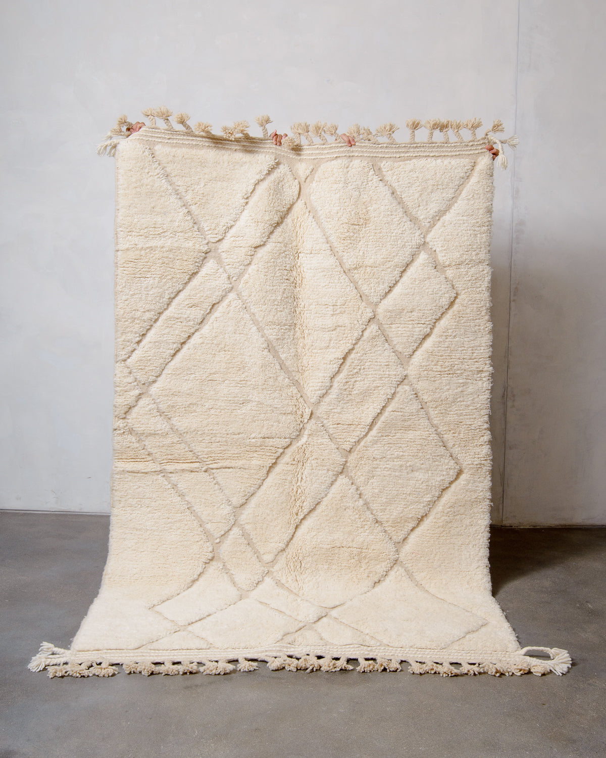 Modern, designer, handcrafted Berber rug from Morocco. Beniourain carpet with minimalist design, natural wool pile and a fluffy texture.