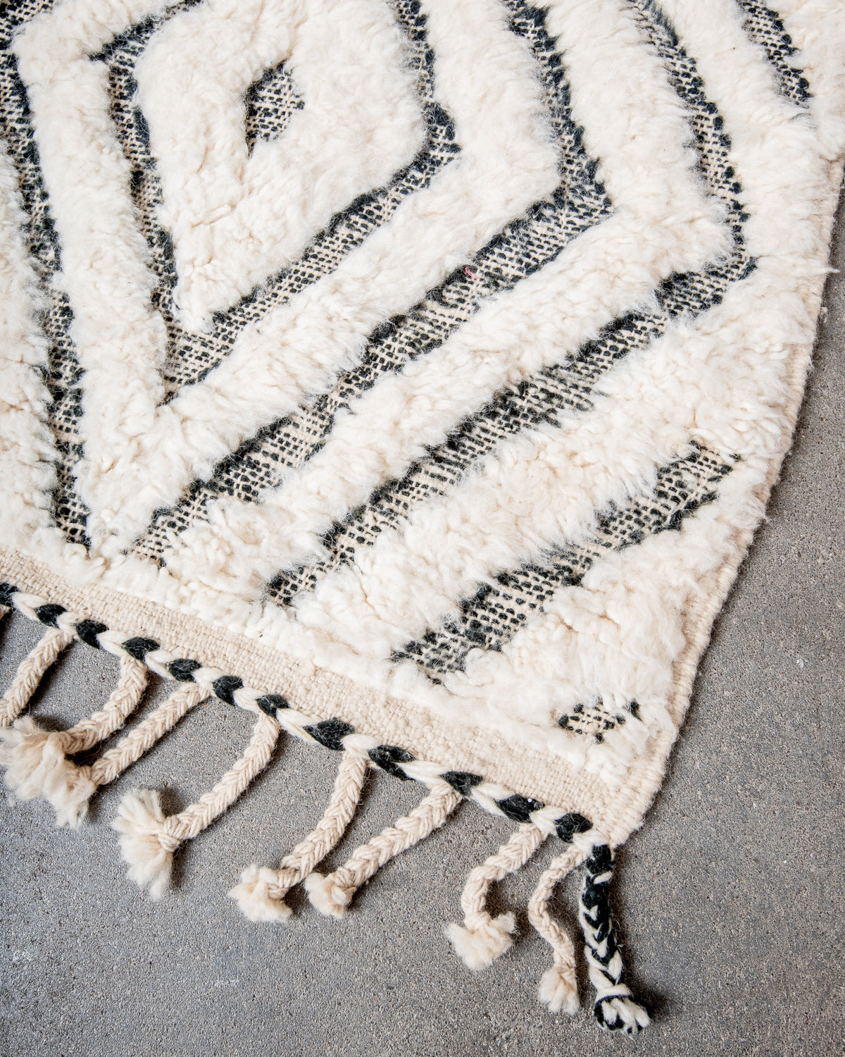 Modern, designer, handcrafted Berber rug from Morocco. Beniourain carpet with minimalist design, natural wool pile and a fluffy texture.