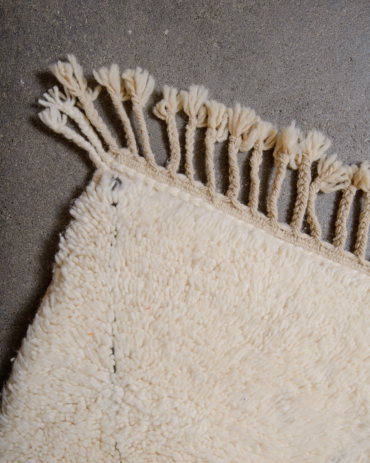 Modern, designer, handcrafted Berber rug from Morocco. Beniourain carpet with minimalist design, natural wool pile and a fluffy texture.