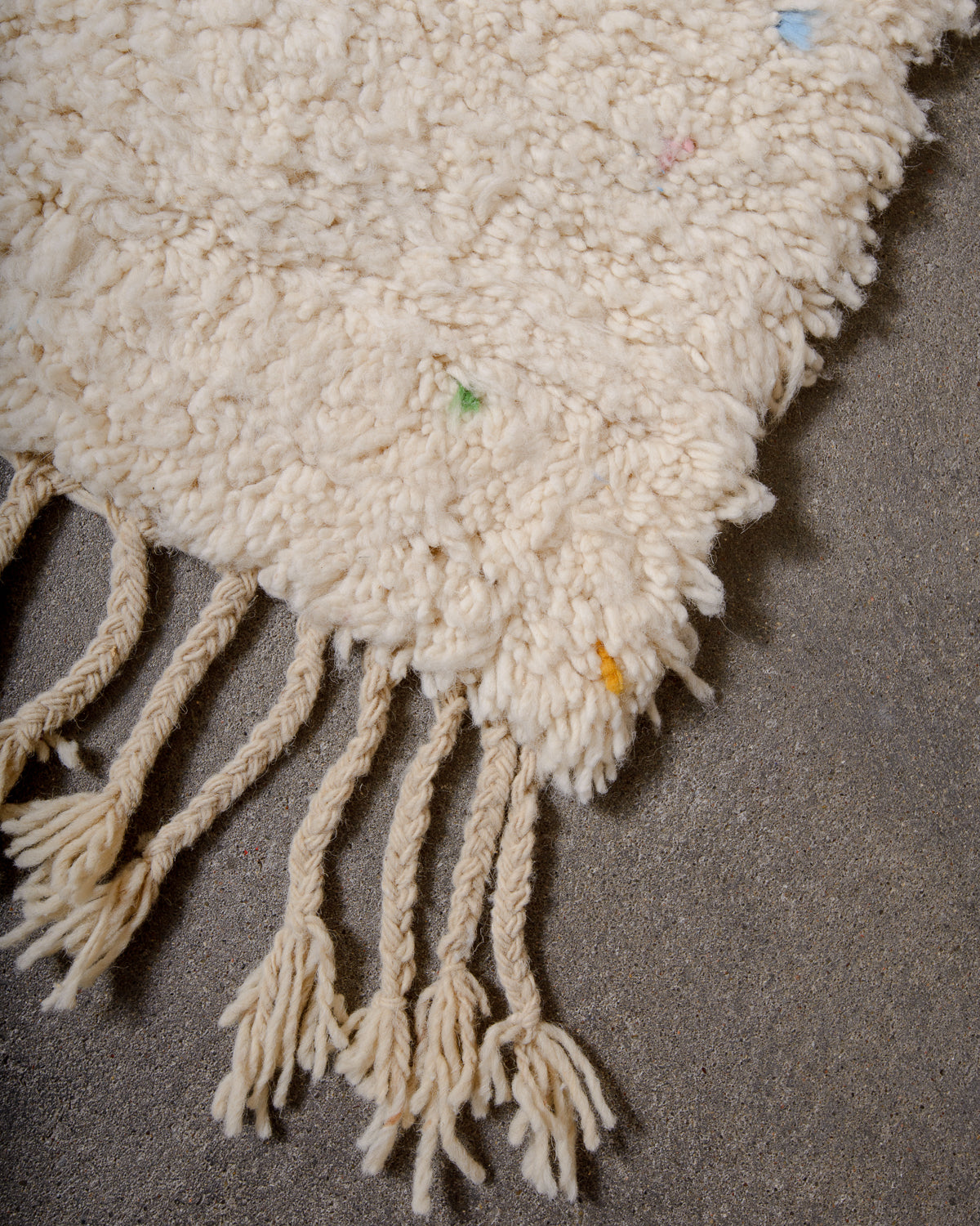 Modern, designer, handcrafted Berber rug from Morocco. Beniourain carpet with minimalist design, natural wool pile and a fluffy texture.