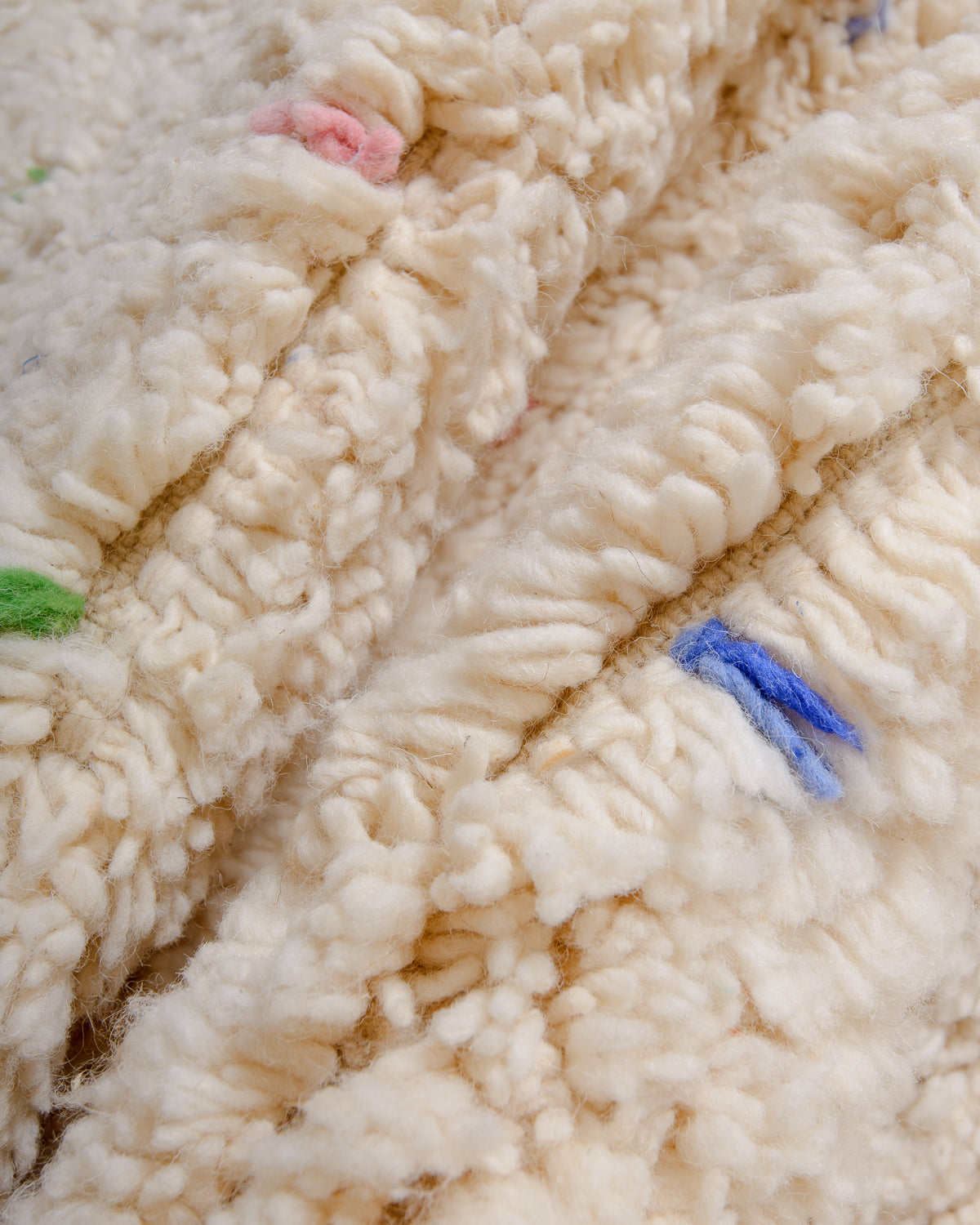 Modern, designer, handcrafted Berber rug from Morocco. Beniourain carpet with minimalist design, natural wool pile and a fluffy texture.