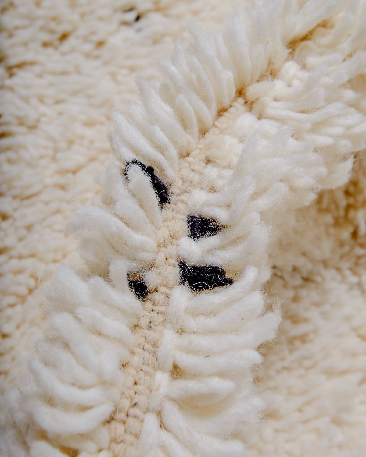 Modern, designer, handcrafted Berber rug from Morocco. Beniourain carpet with minimalist design, natural wool pile and a fluffy texture.