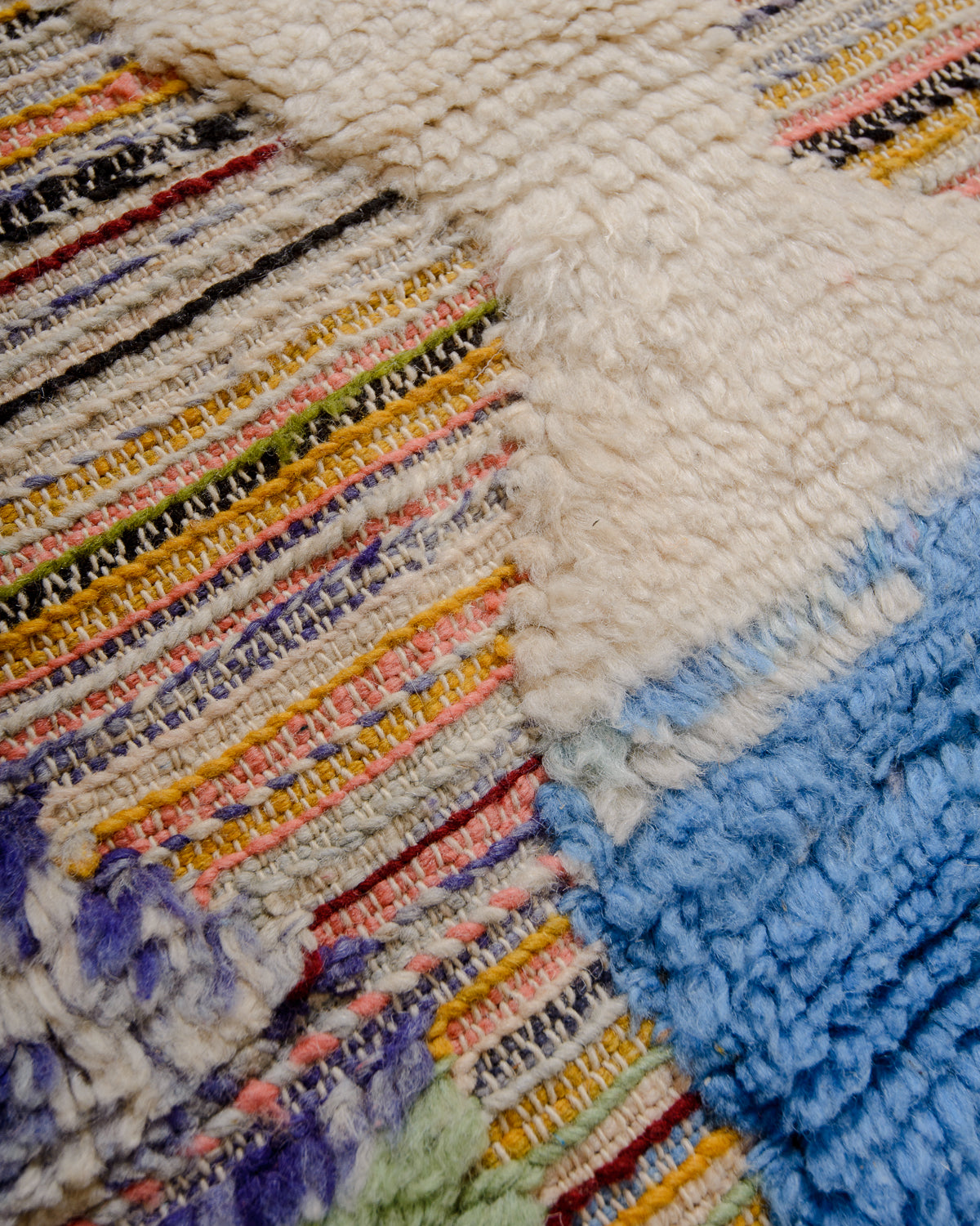 Modern, designer, handcrafted Berber rug from Morocco. Beniourain carpet with beautiful colours and patterns and fluffy wool texture.