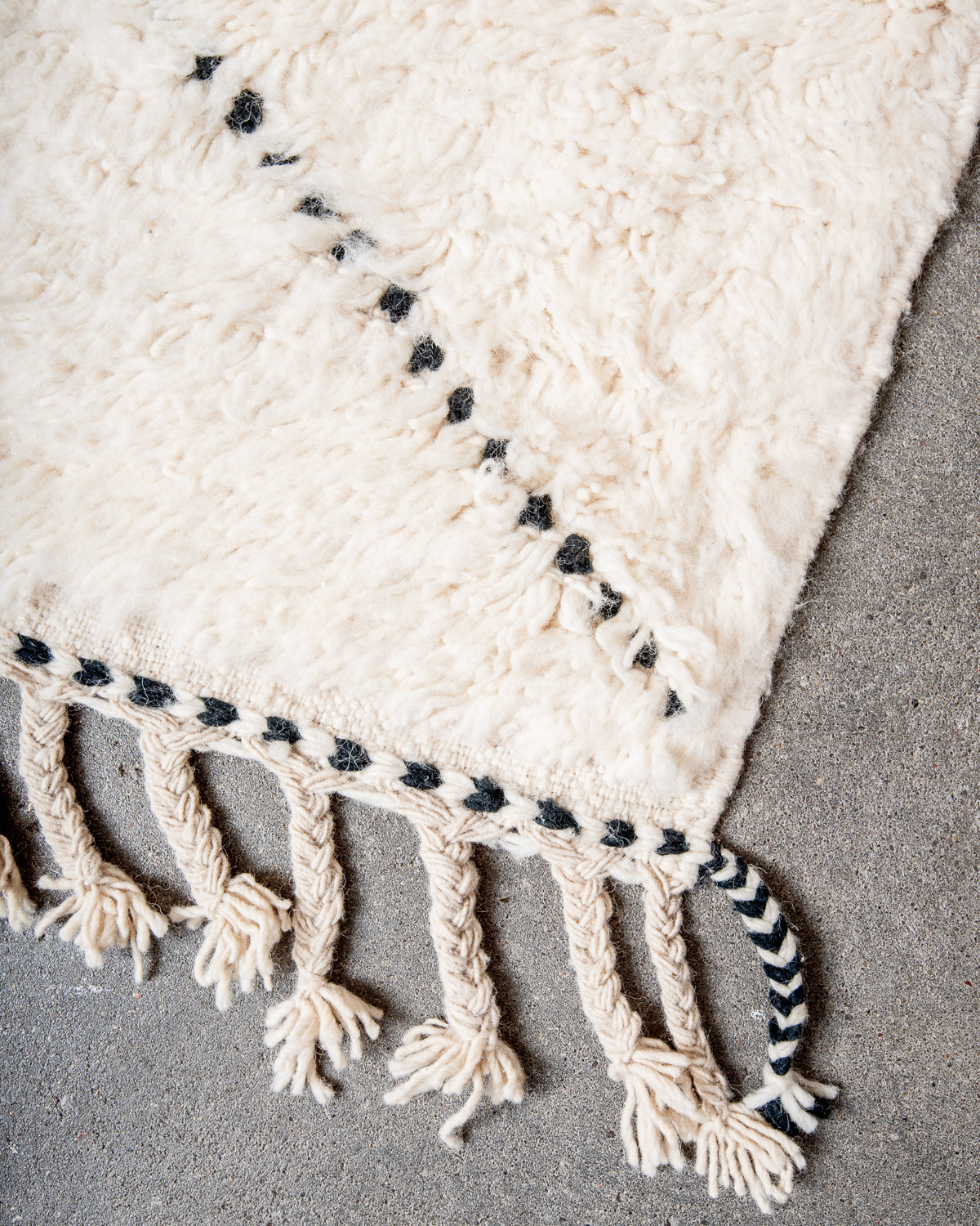 Modern, designer, handcrafted Berber rug from Morocco. Beniourain carpet with minimalist design, natural wool pile and a fluffy texture.