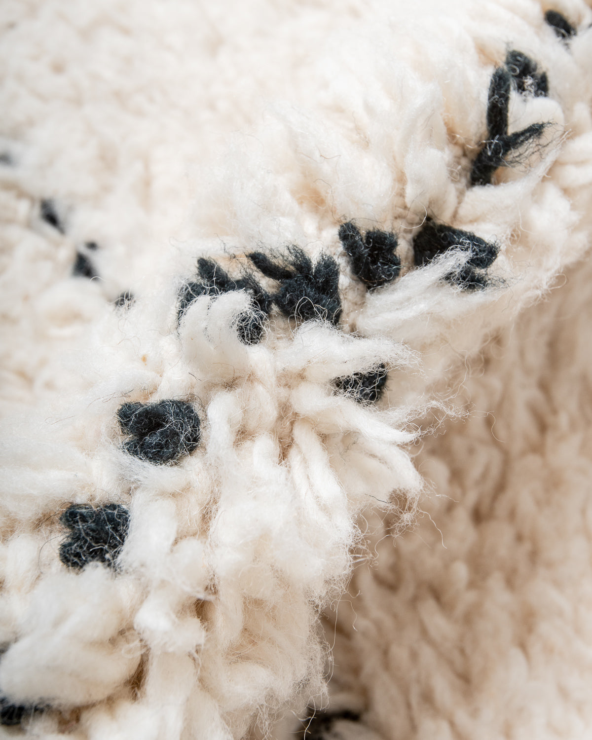 Modern, designer, handcrafted Berber rug from Morocco. Beniourain carpet with minimalist design, natural wool pile and a fluffy texture.