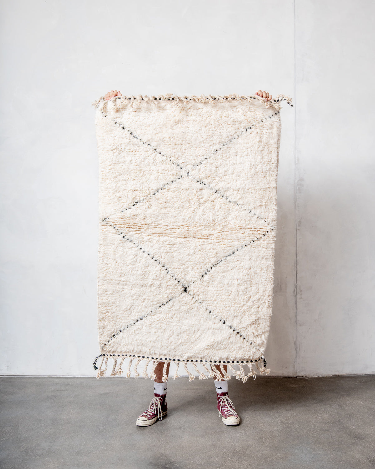 Modern, designer, handcrafted Berber rug from Morocco. Beniourain carpet with minimalist design, natural wool pile and a fluffy texture.