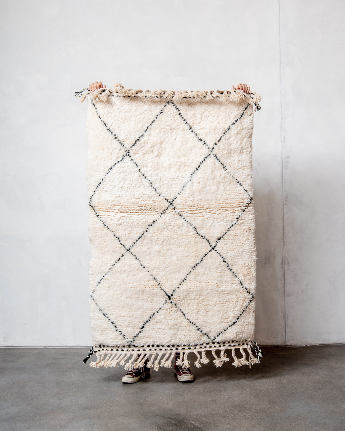 Modern, designer, handcrafted Berber rug from Morocco. Beniourain carpet with minimalist design, natural wool pile and a fluffy texture.