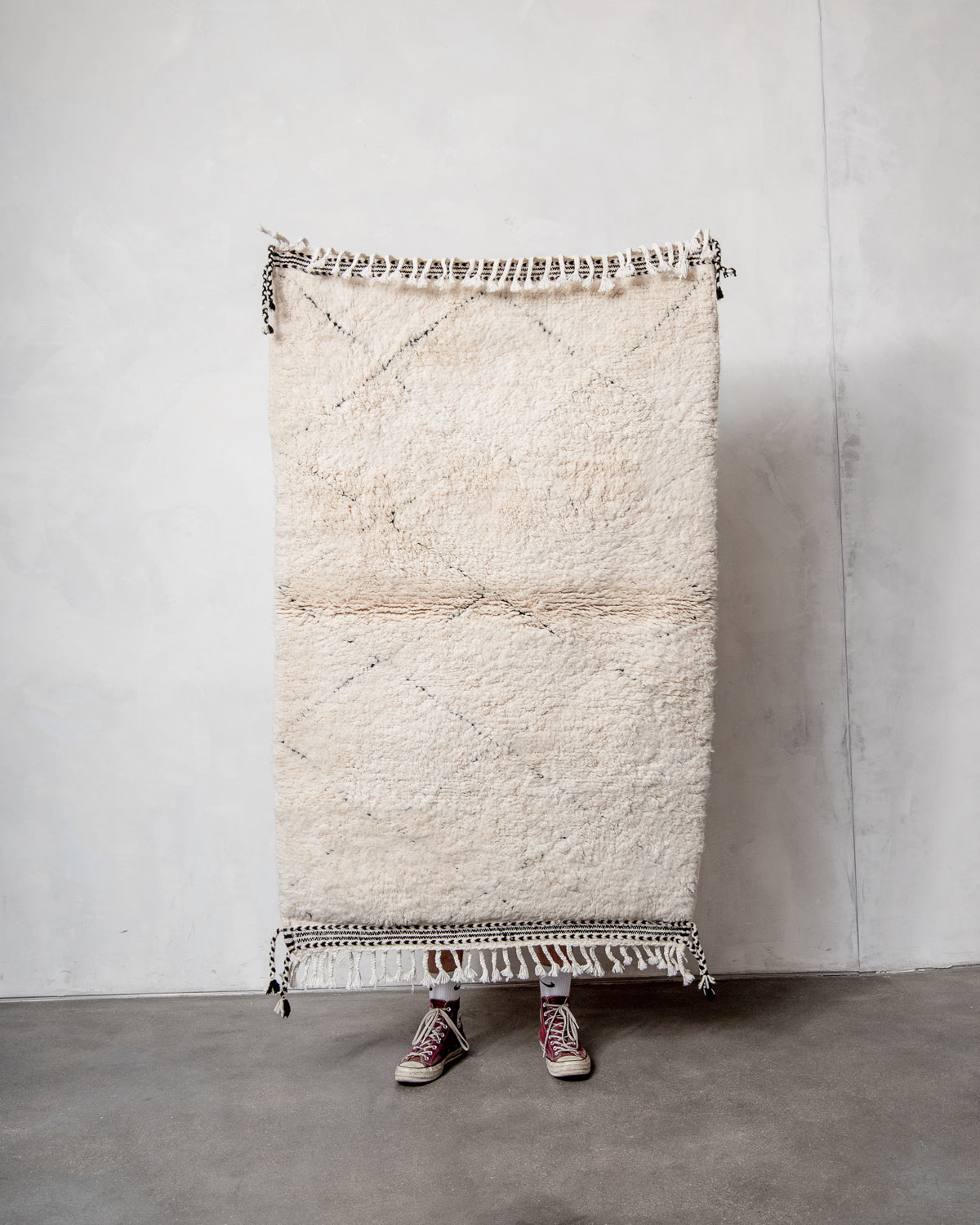 Modern, designer, handcrafted Berber rug from Morocco. Beniourain carpet with minimalist design, natural wool pile and a fluffy texture.