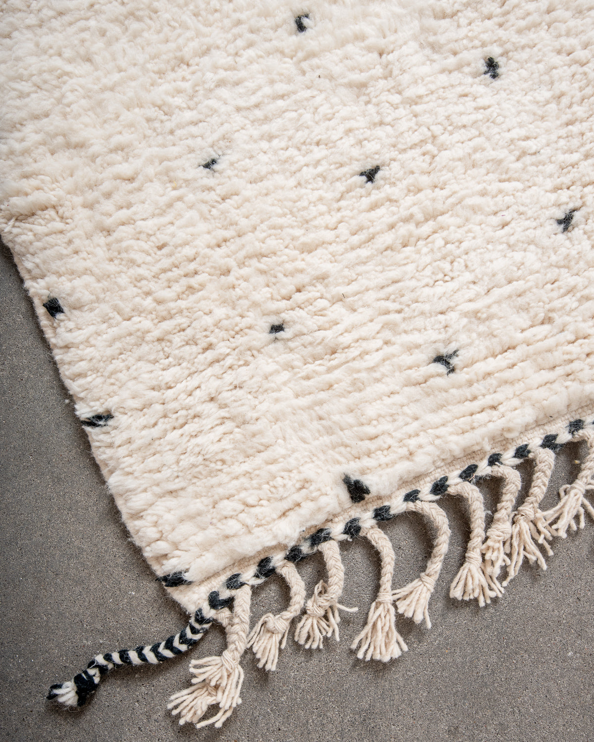 Modern, designer, handcrafted Berber rug from Morocco. Beniourain carpet with minimalist design, natural wool pile and a fluffy texture.
