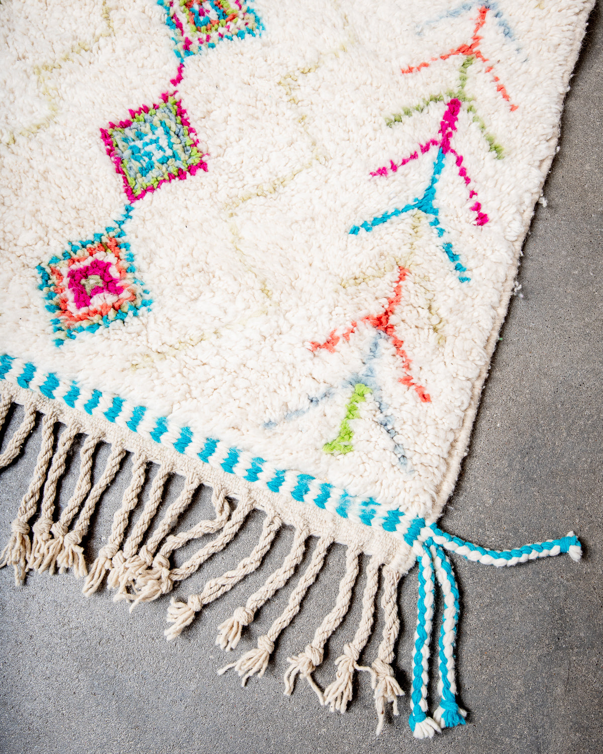 Modern, designer, handcrafted Berber runner rug from Morocco. Beniourain carpet with beautiful colours and patterns and fluffy wool texture.