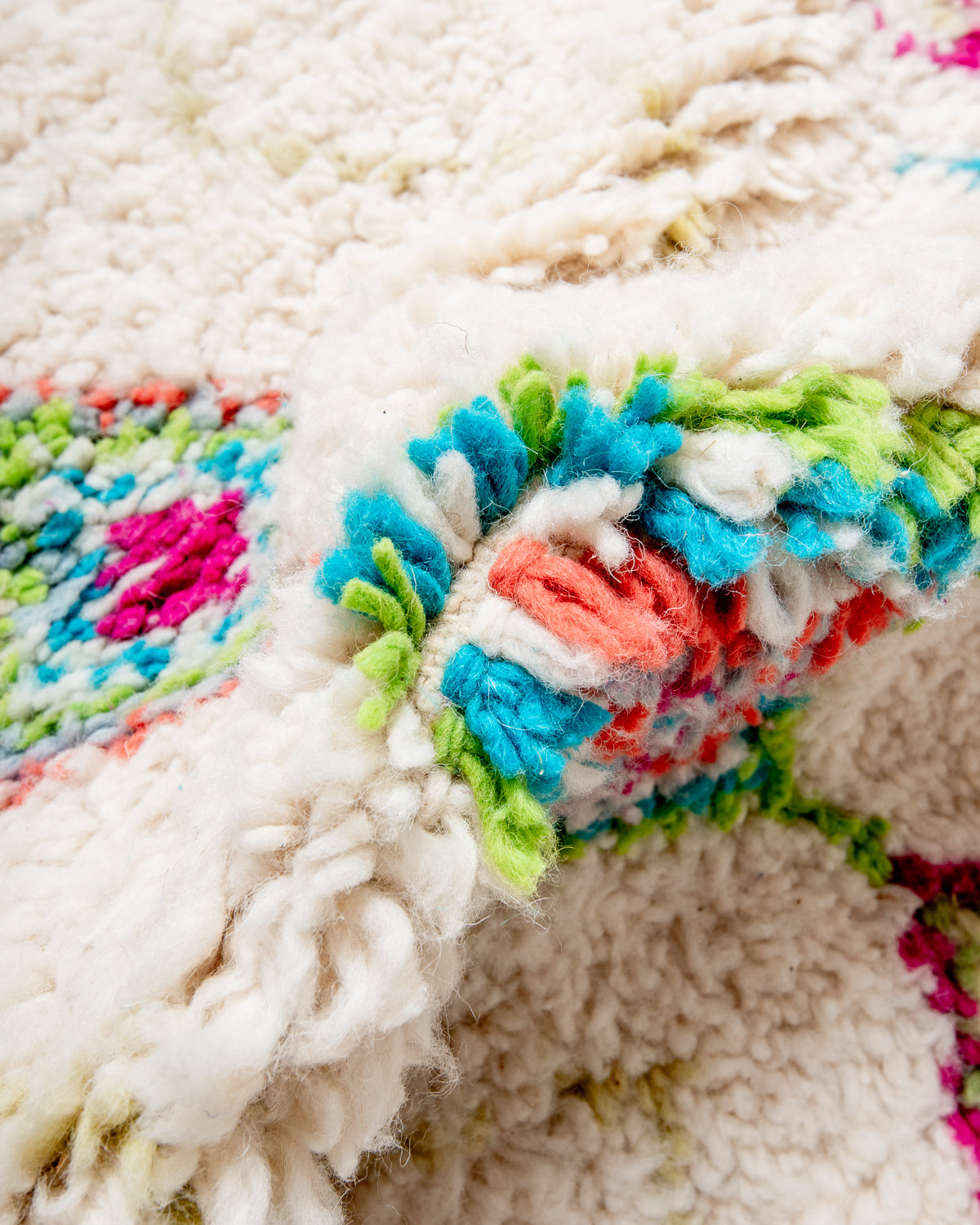 Modern, designer, handcrafted Berber runner rug from Morocco. Beniourain carpet with beautiful colours and patterns and fluffy wool texture.