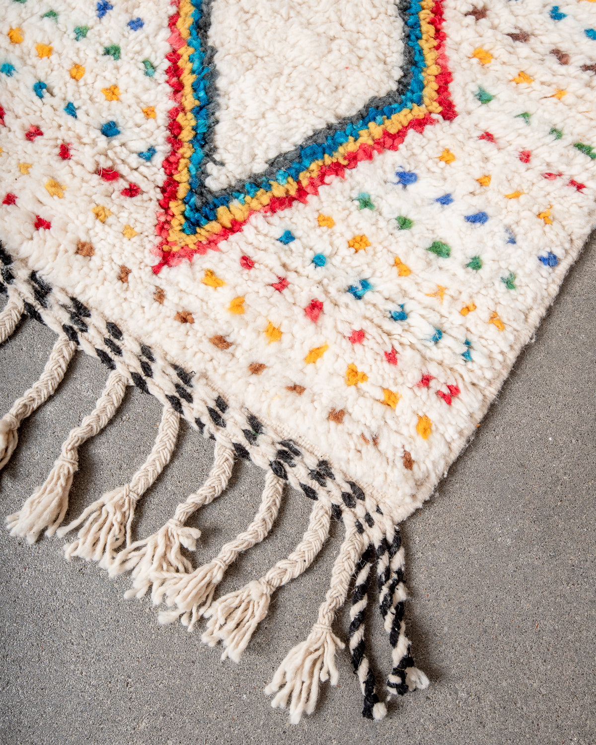 Modern, designer, handcrafted Berber rug from Morocco. Beniourain carpet with beautiful colours and patterns and fluffy wool texture.