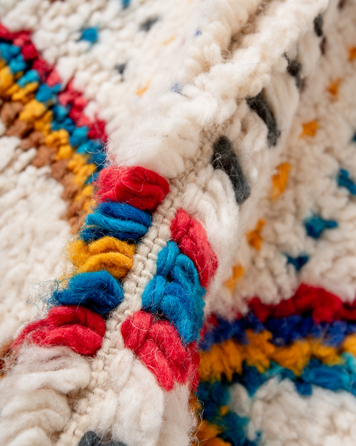 Modern, designer, handcrafted Berber rug from Morocco. Beniourain carpet with beautiful colours and patterns and fluffy wool texture.