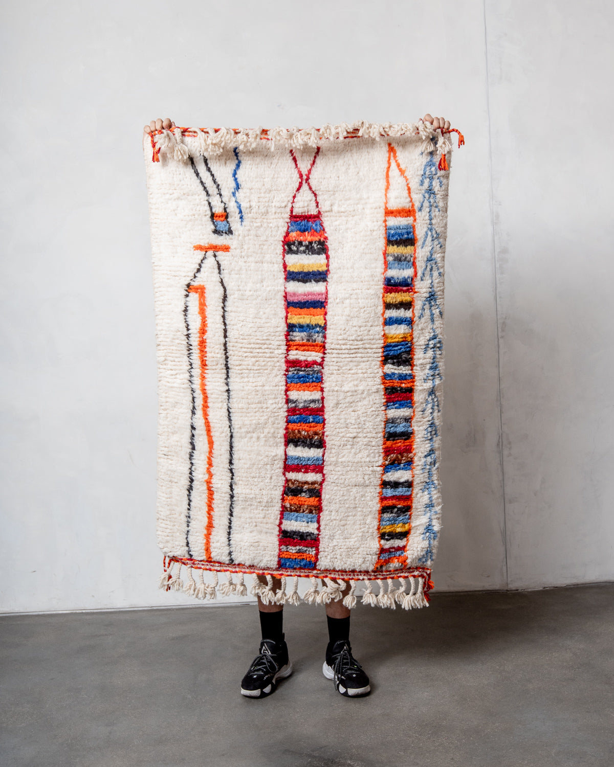 Modern, designer, handcrafted Berber rug from Morocco. Beniourain carpet with beautiful colours and patterns and fluffy wool texture.