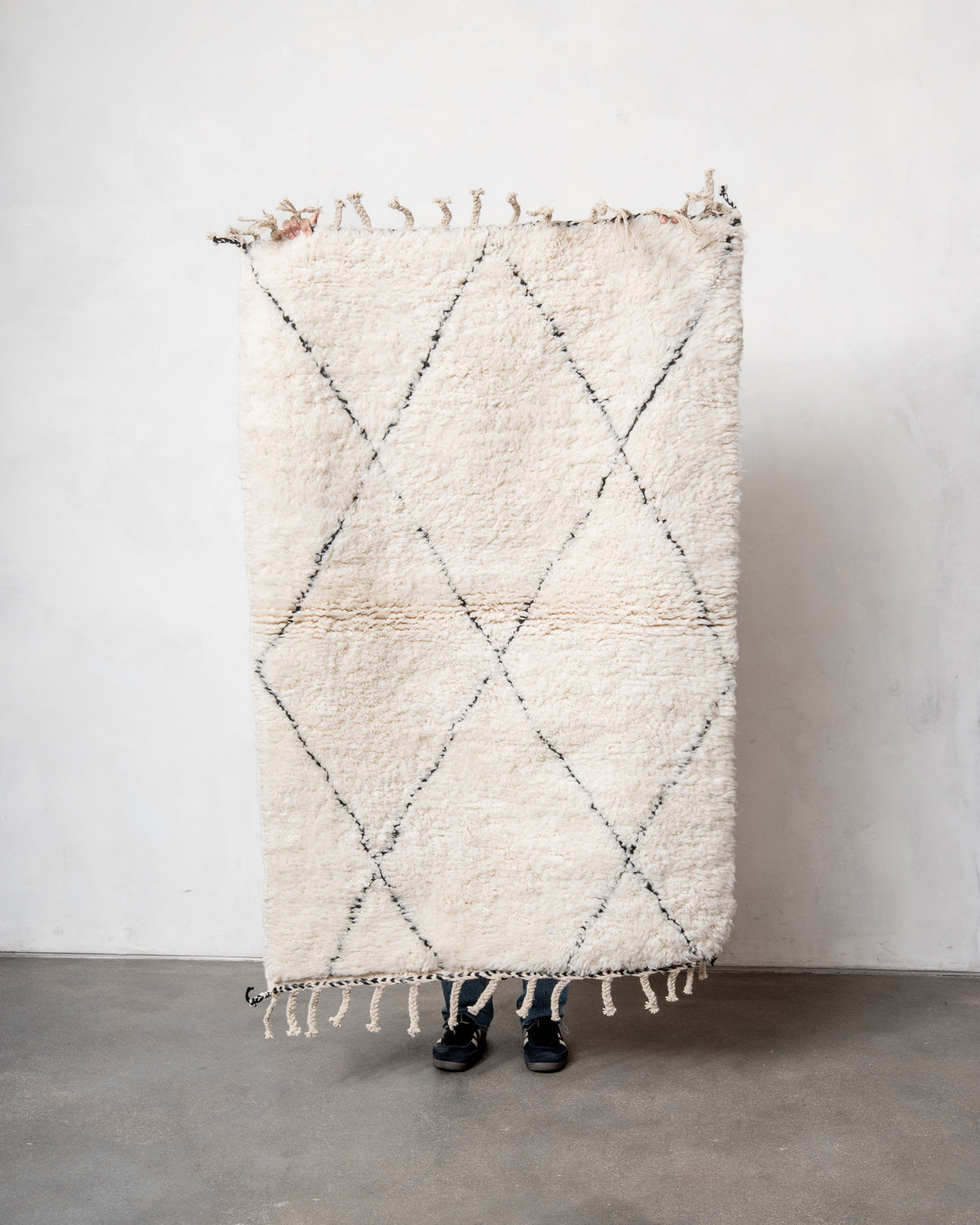 Modern, designer, handcrafted Berber rug from Morocco. Beniourain carpet with minimalist design, natural wool pile and a fluffy texture.