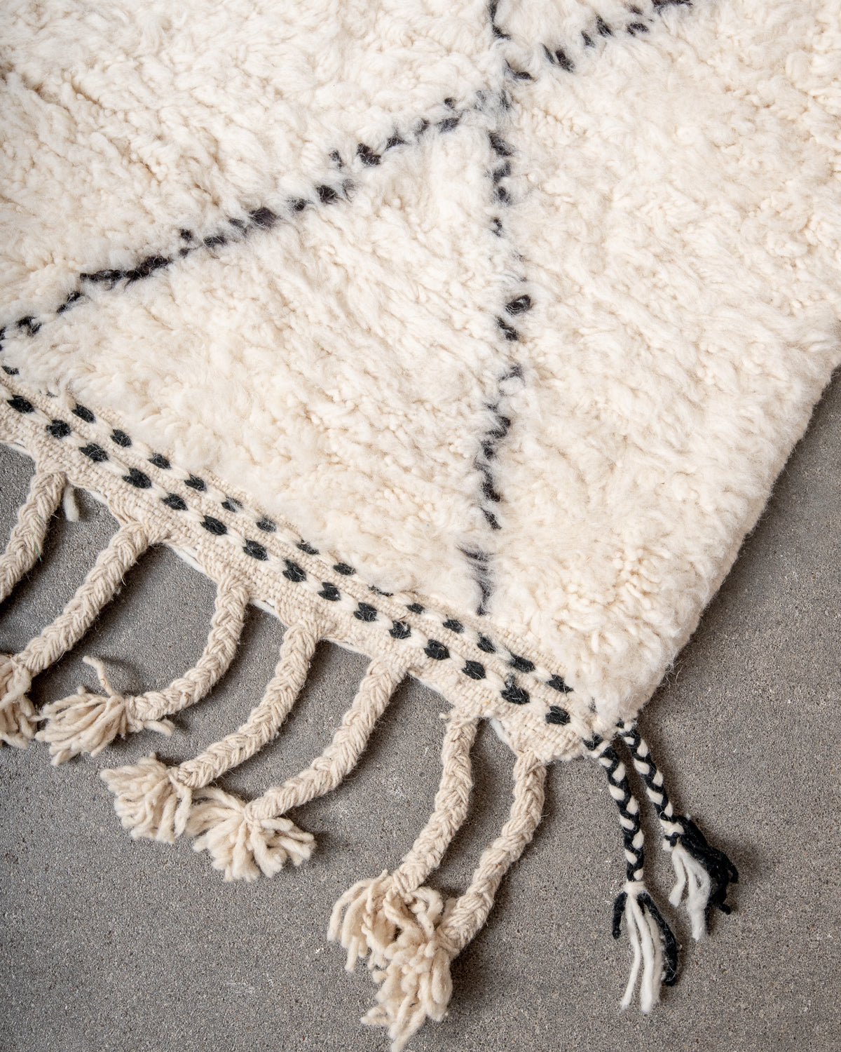 Modern, designer, handcrafted Berber rug from Morocco. Beniourain carpet with minimalist design, natural wool pile and a fluffy texture.